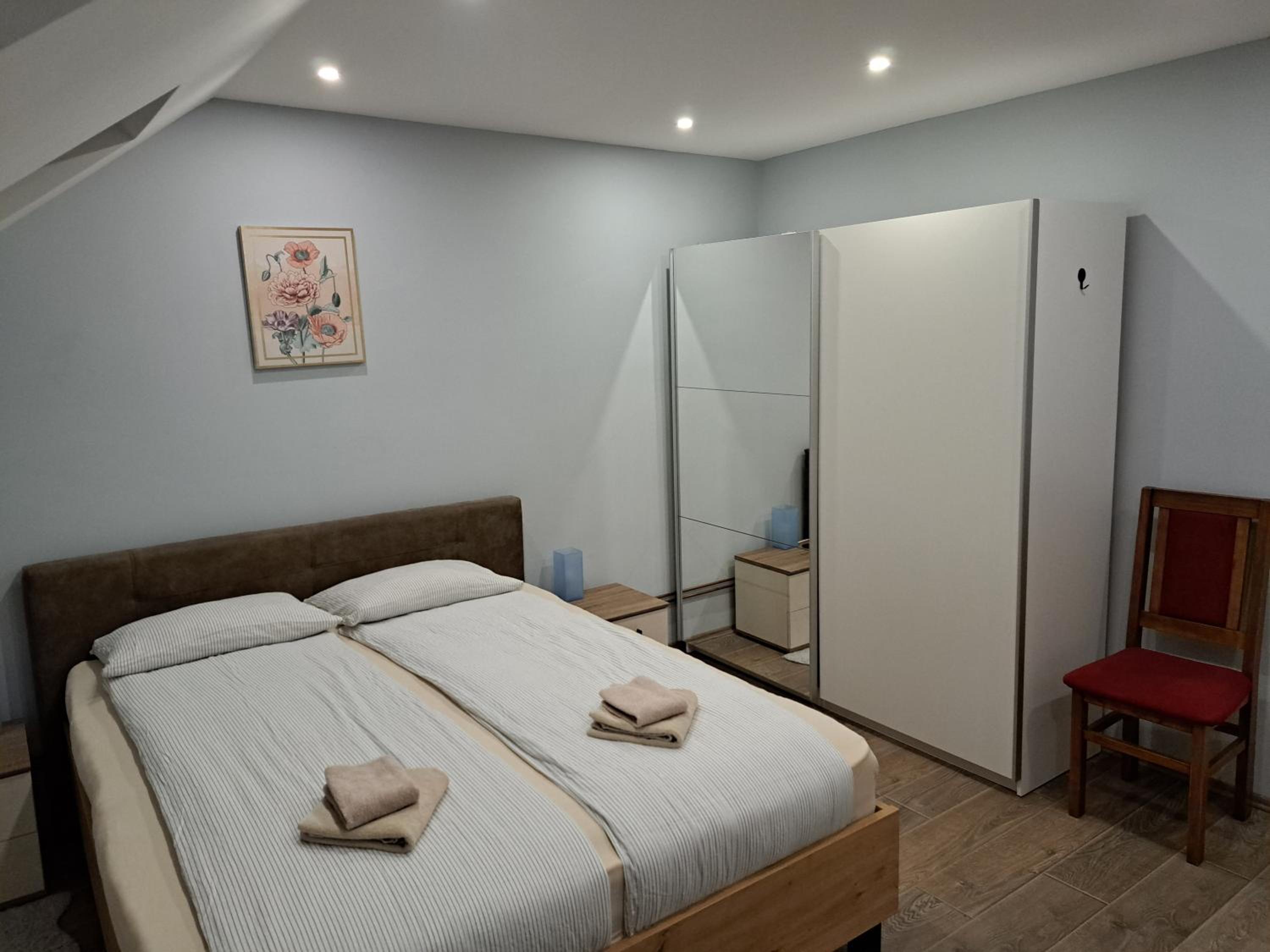 Three-Bedroom Apartment - Photo 8