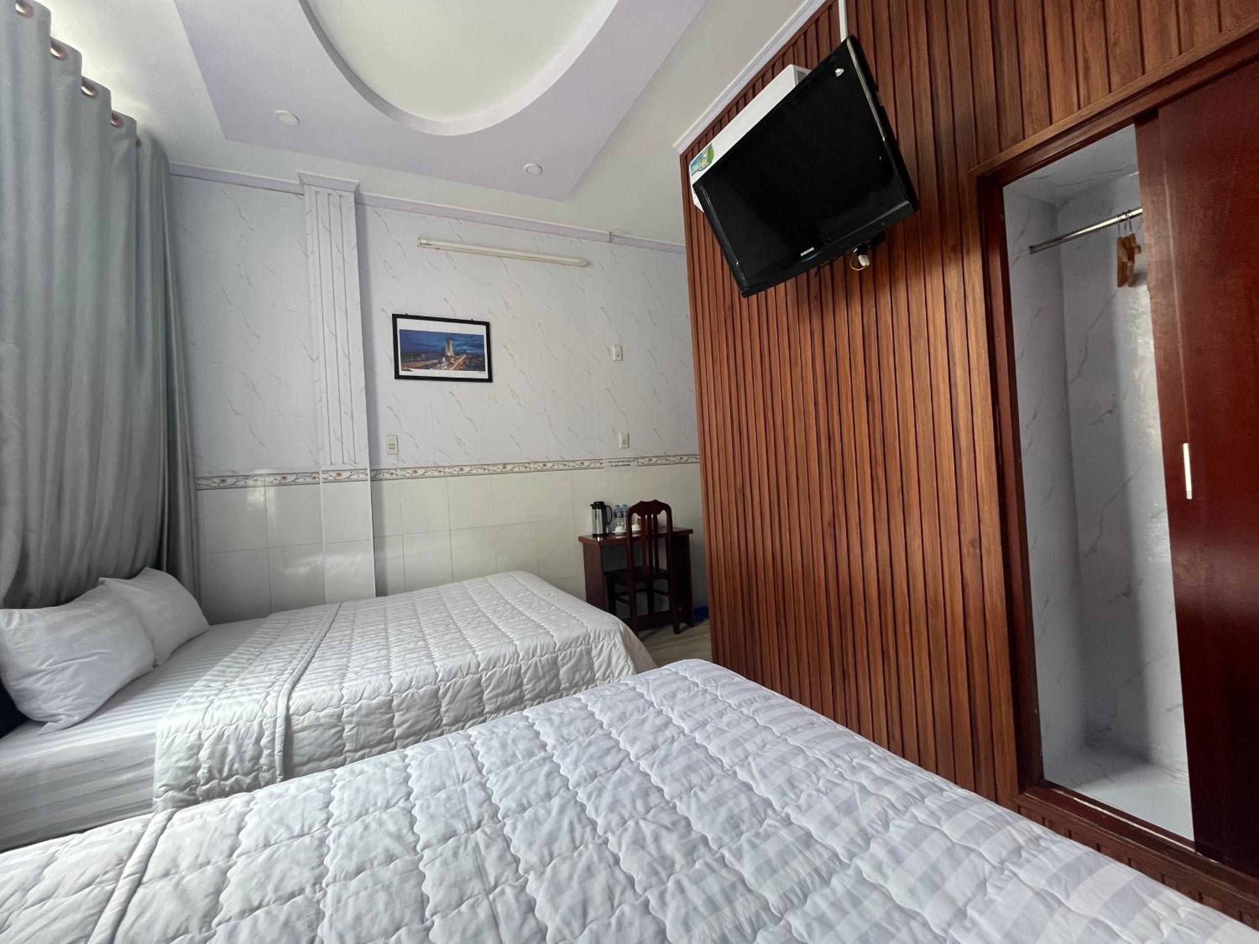 Quadruple Room - Photo 13