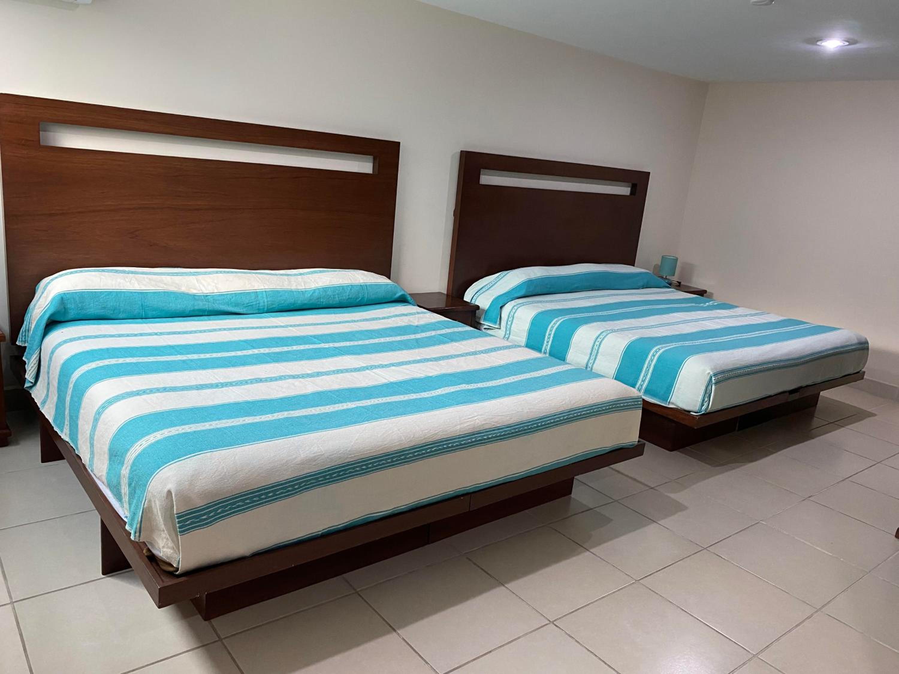 Deluxe Queen Room with Two Queen Beds photo 1