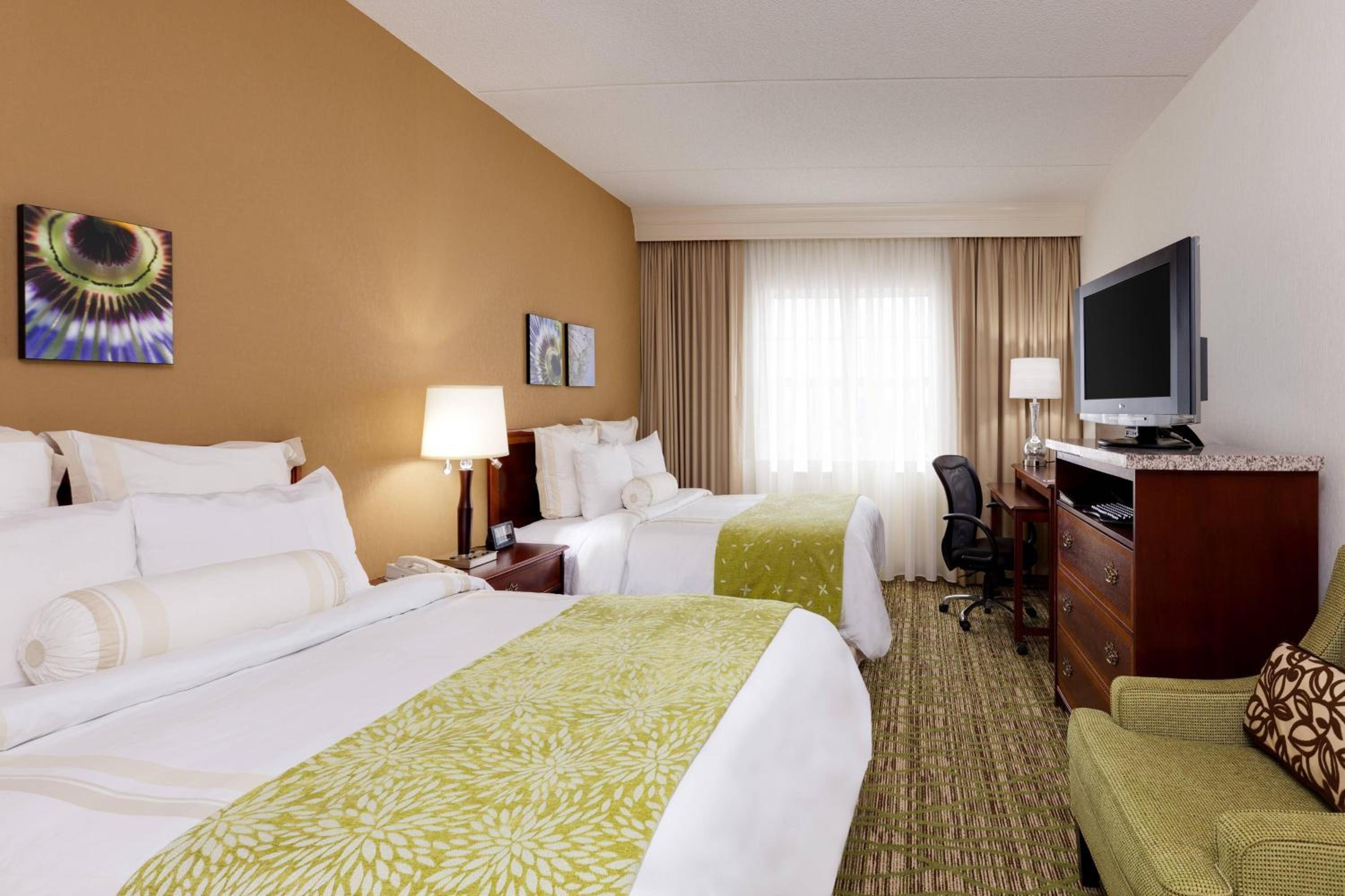 Queen Room with Two Queen Beds - Photo 1