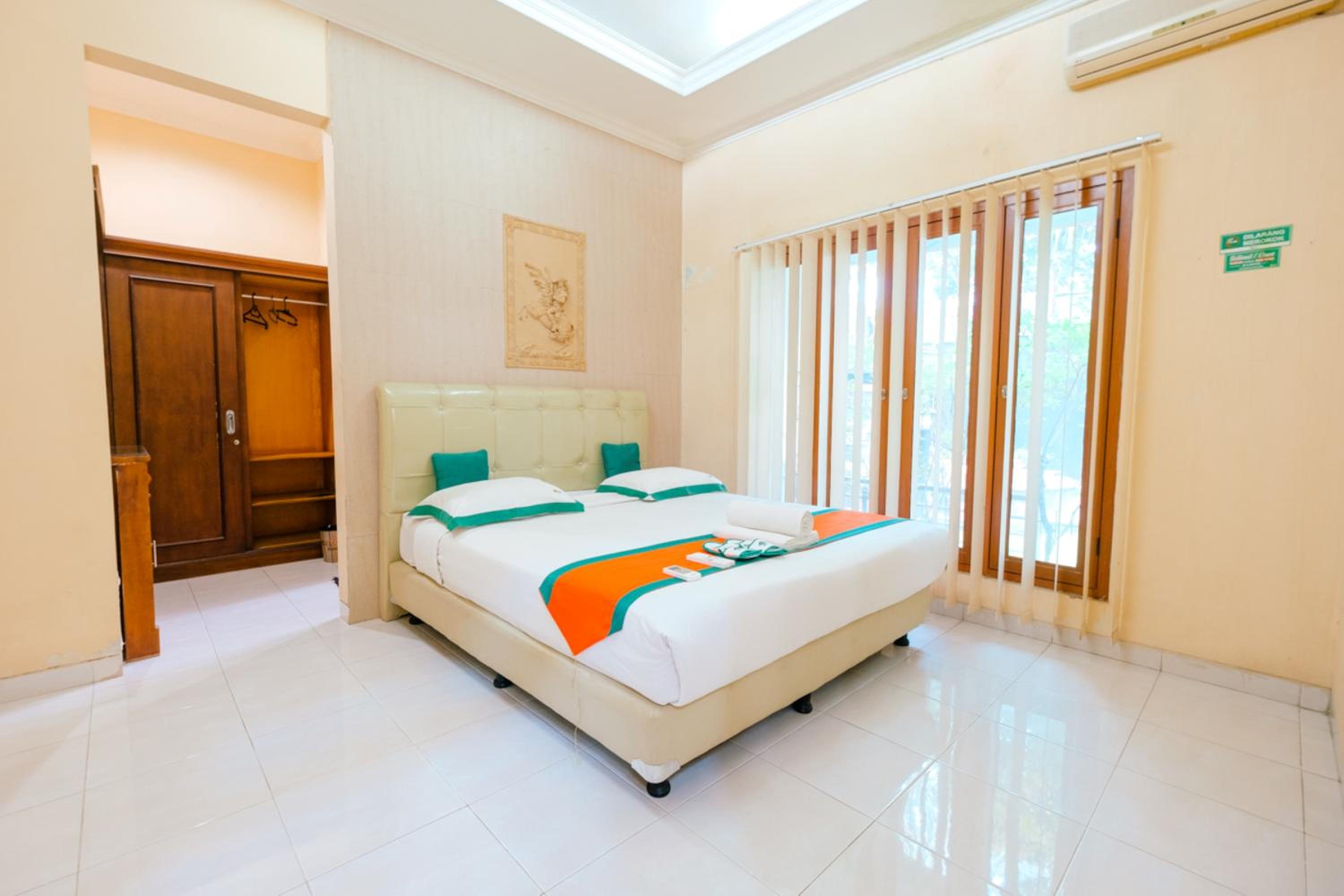 Three-Bedroom House - Photo 16