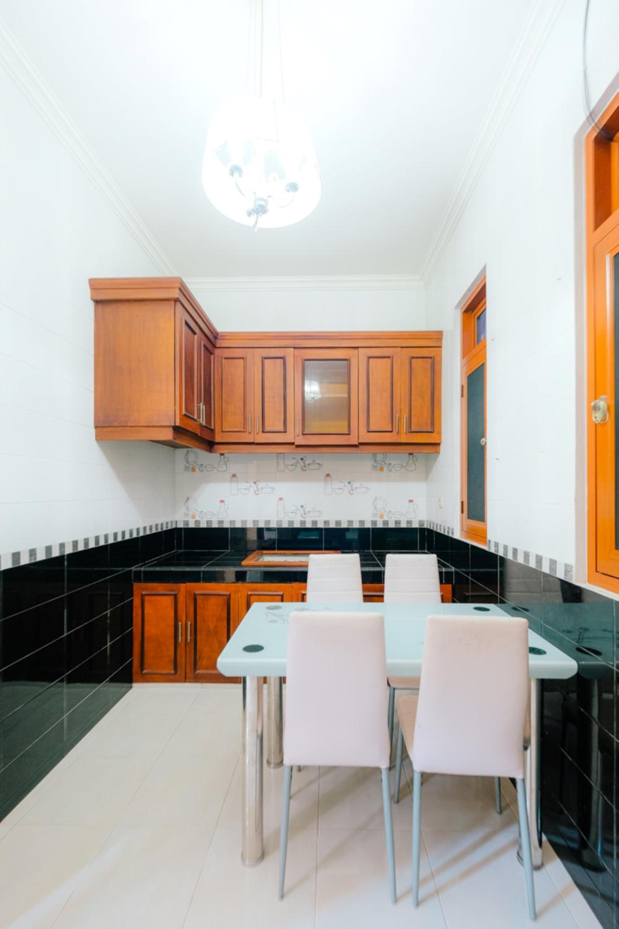 Three-Bedroom House - Photo 11