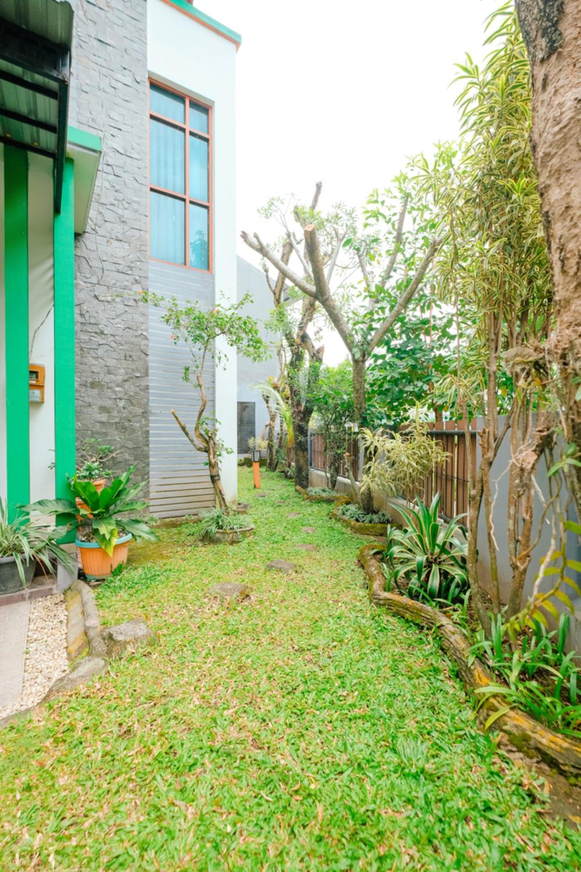 Three-Bedroom House - Photo 18