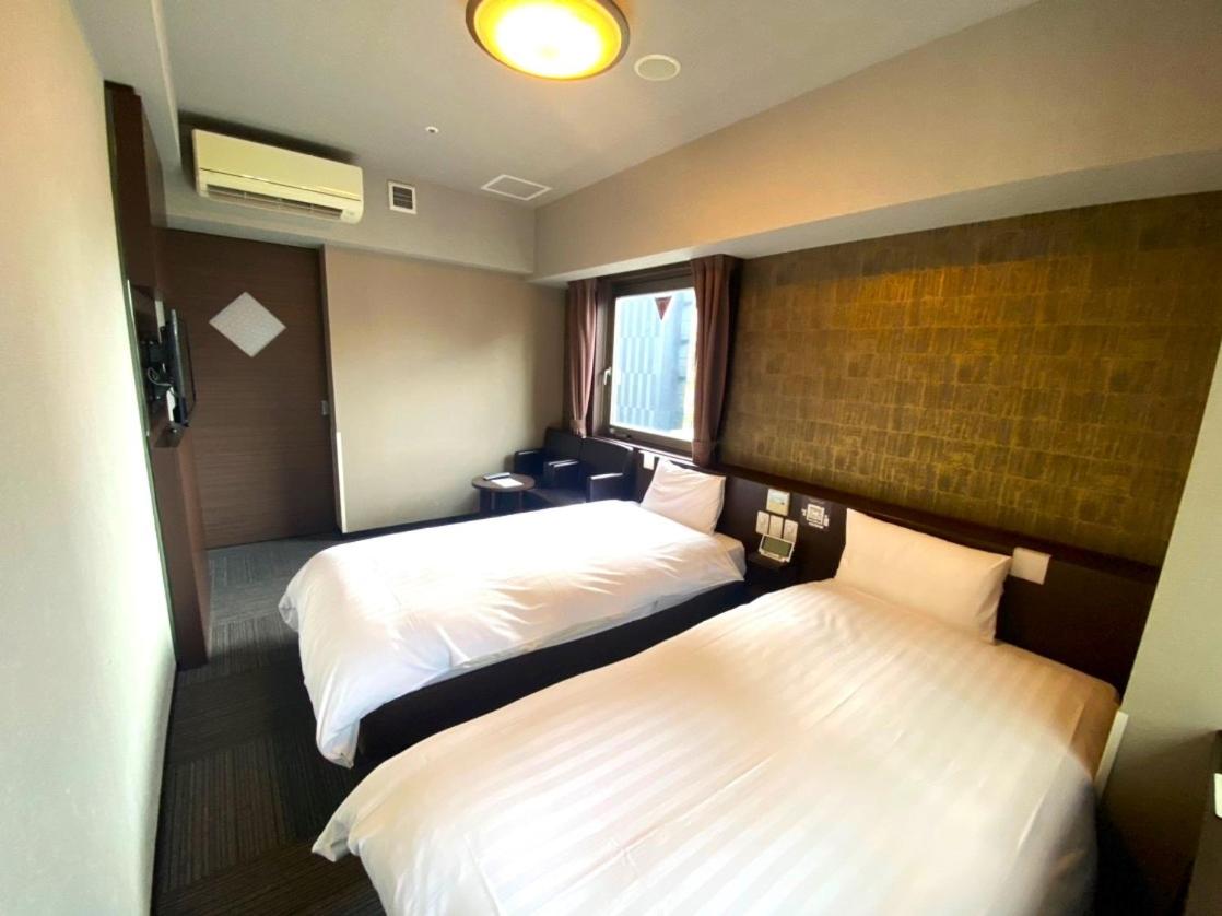 Compact Twin Room without Cleaning Service photo 1