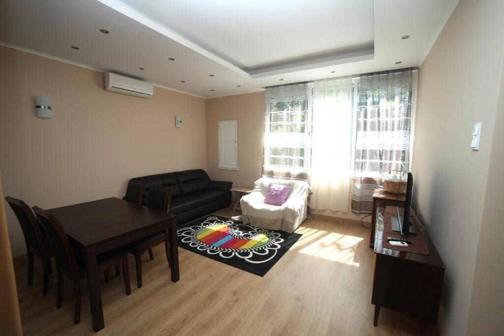 Three-Bedroom Apartment photo 1