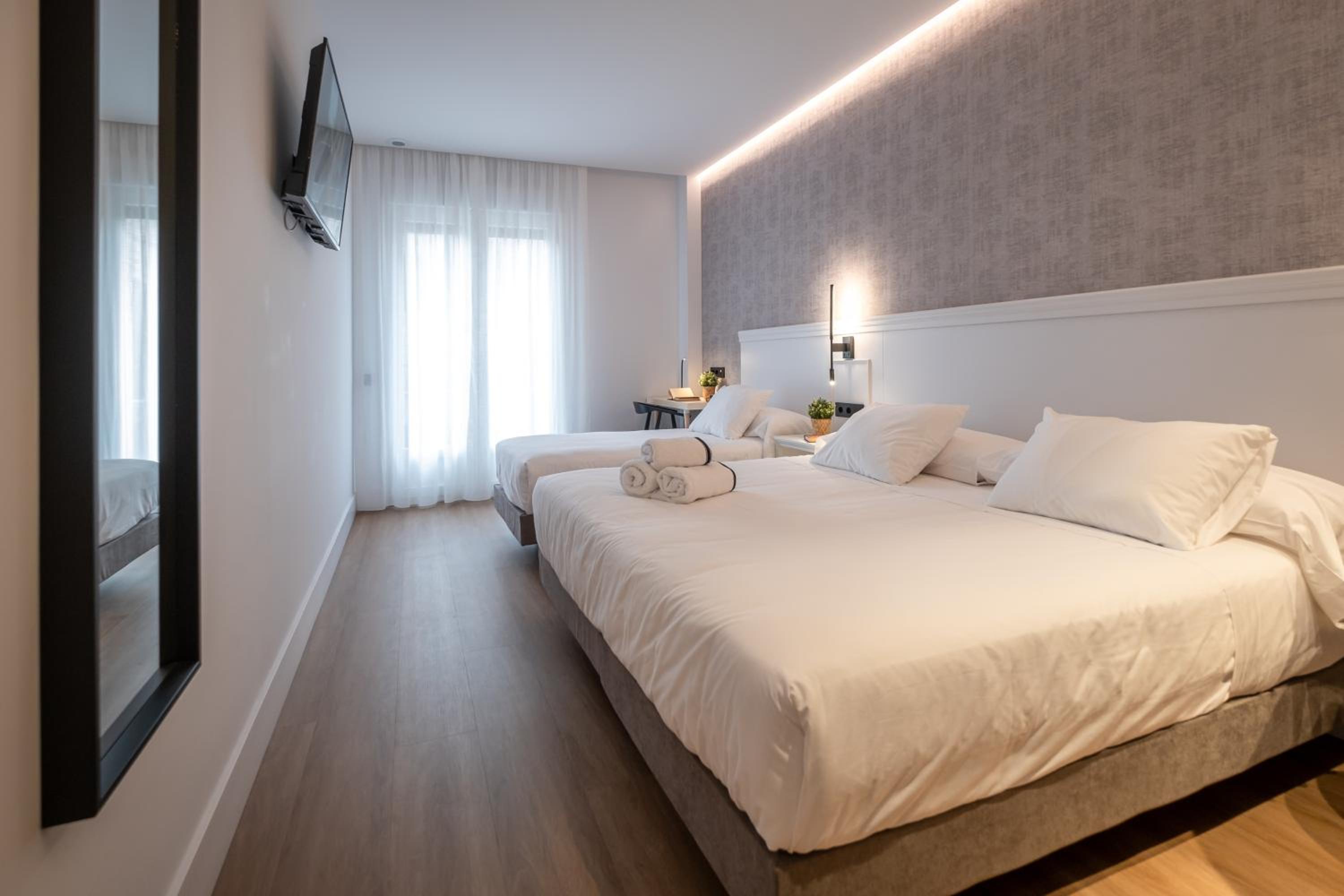 Habitación Triple con Balcón