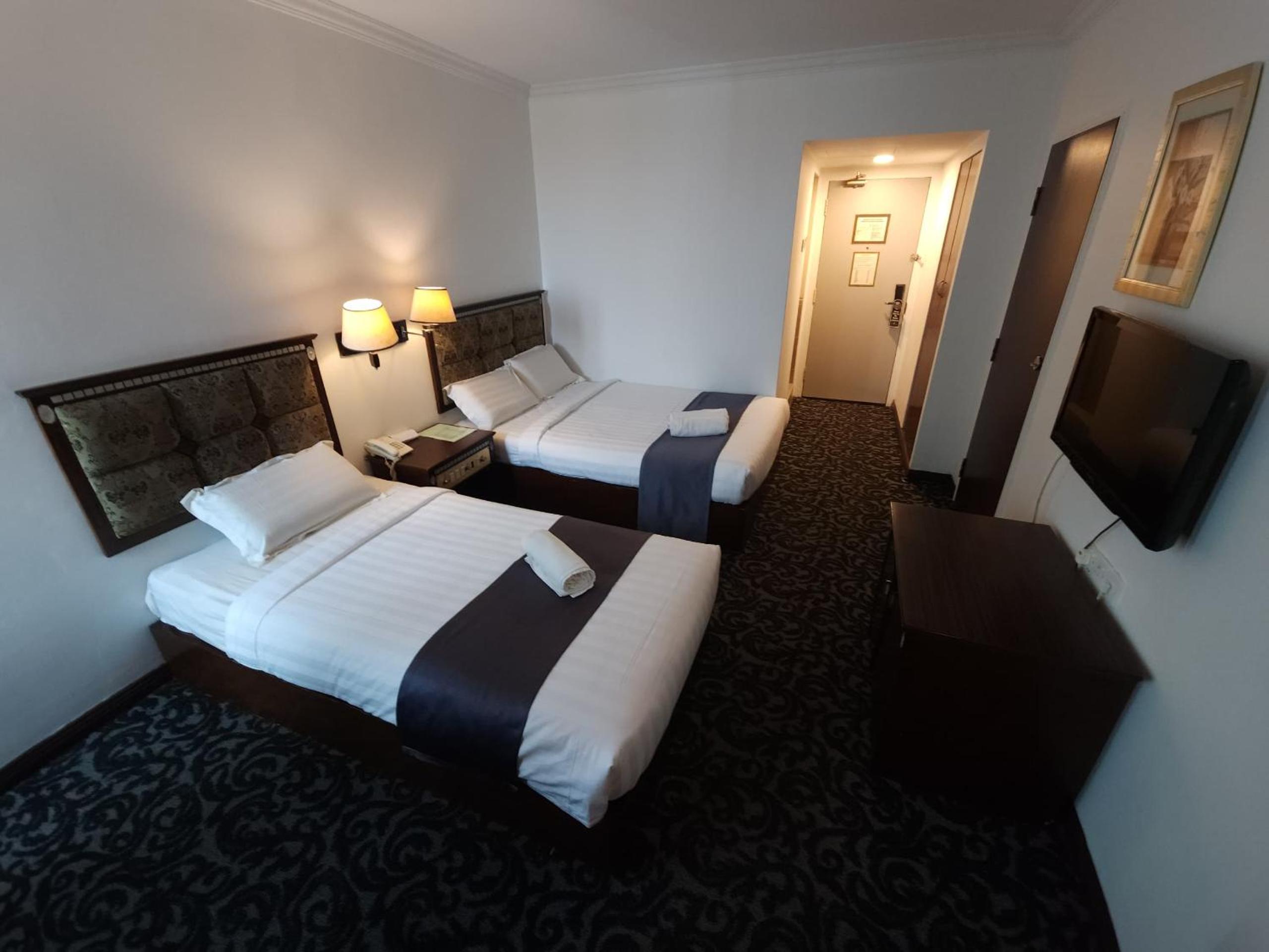 Deluxe Triple Room - Photo 1