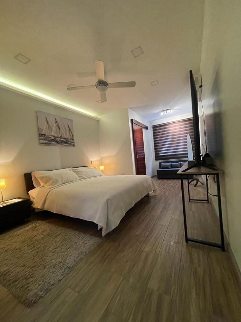 Three-Bedroom Apartment photo 1