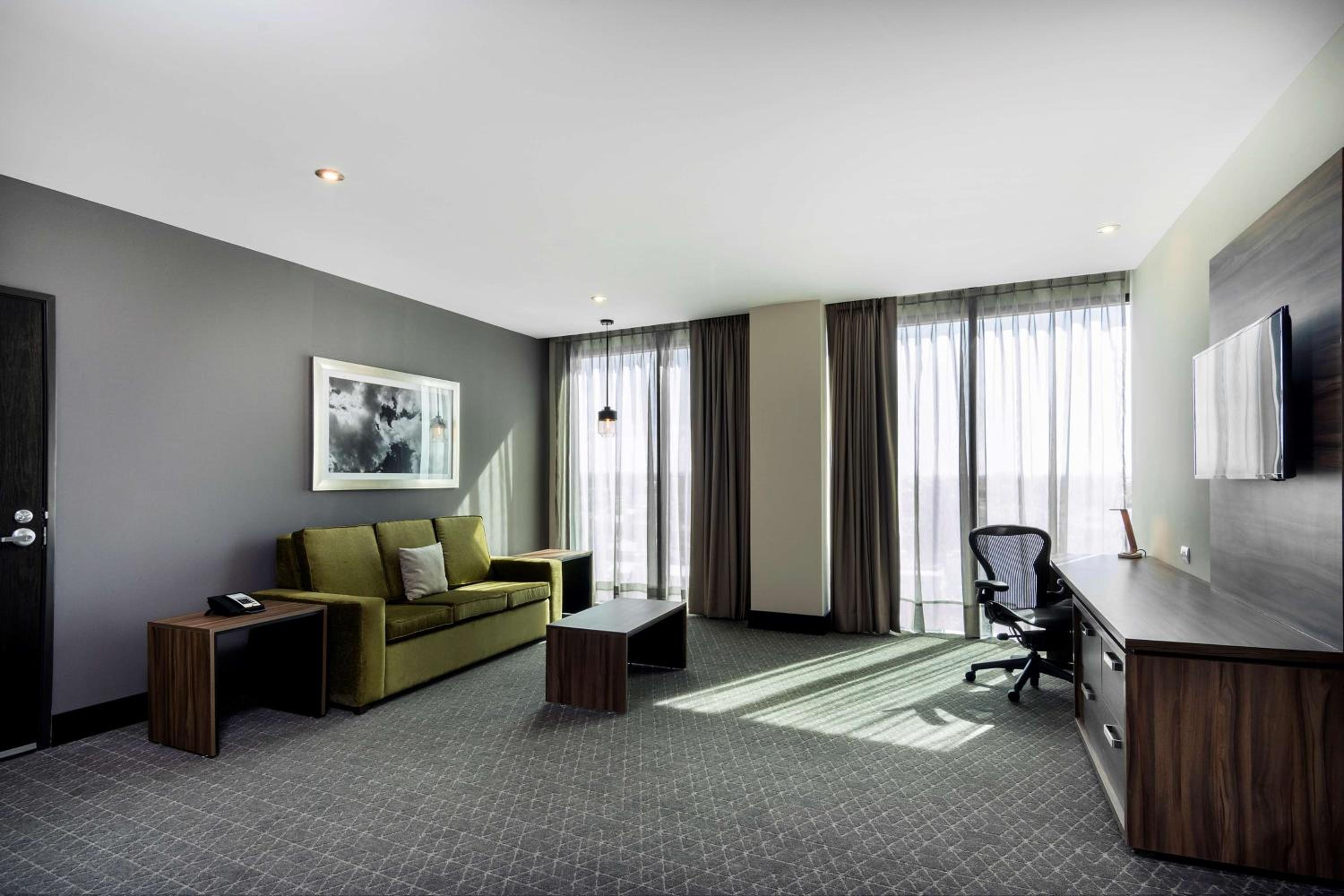 One-Bedroom King Suite with Sofa Bed photo 1