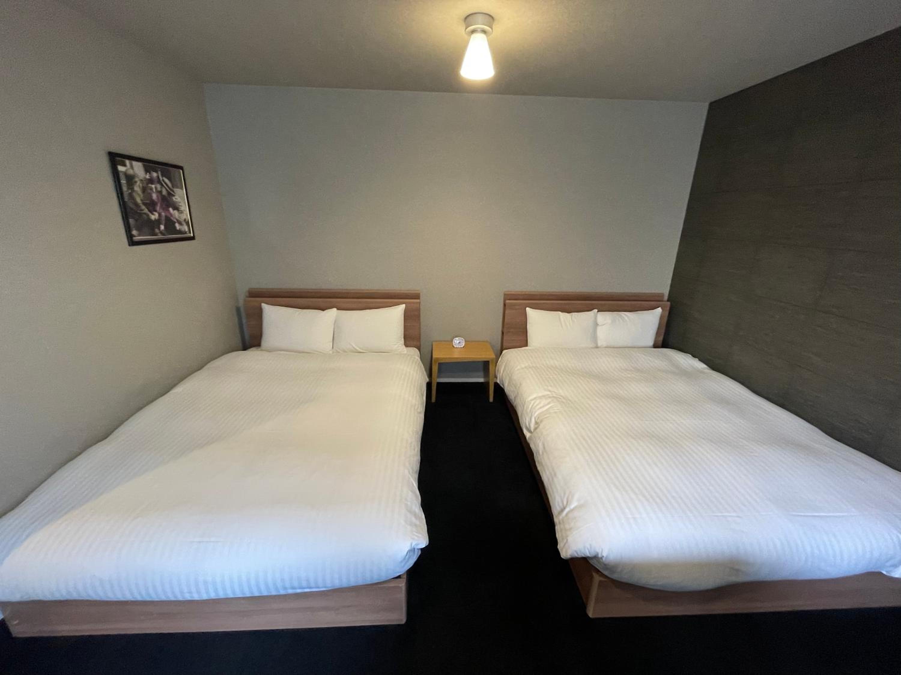 Twin Room - Photo 1