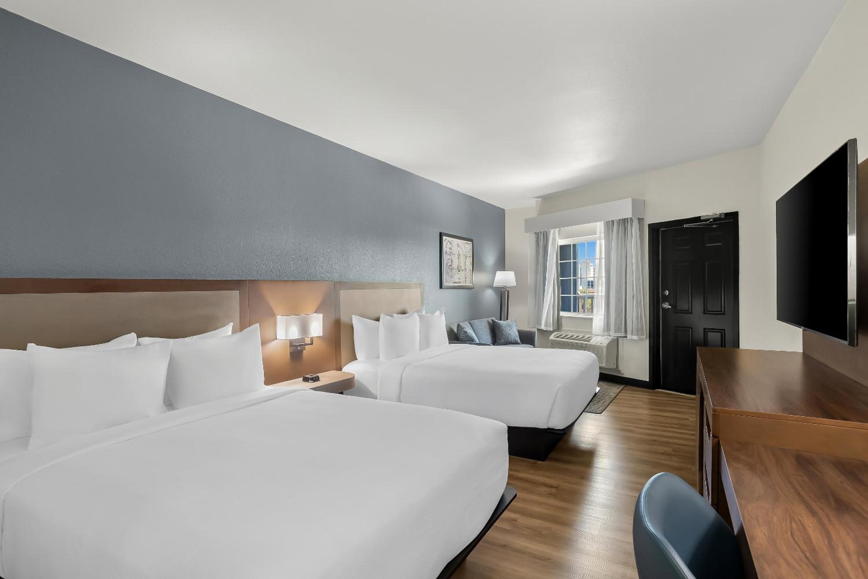 Queen Suite with Two Queen Beds and Sofa Bed