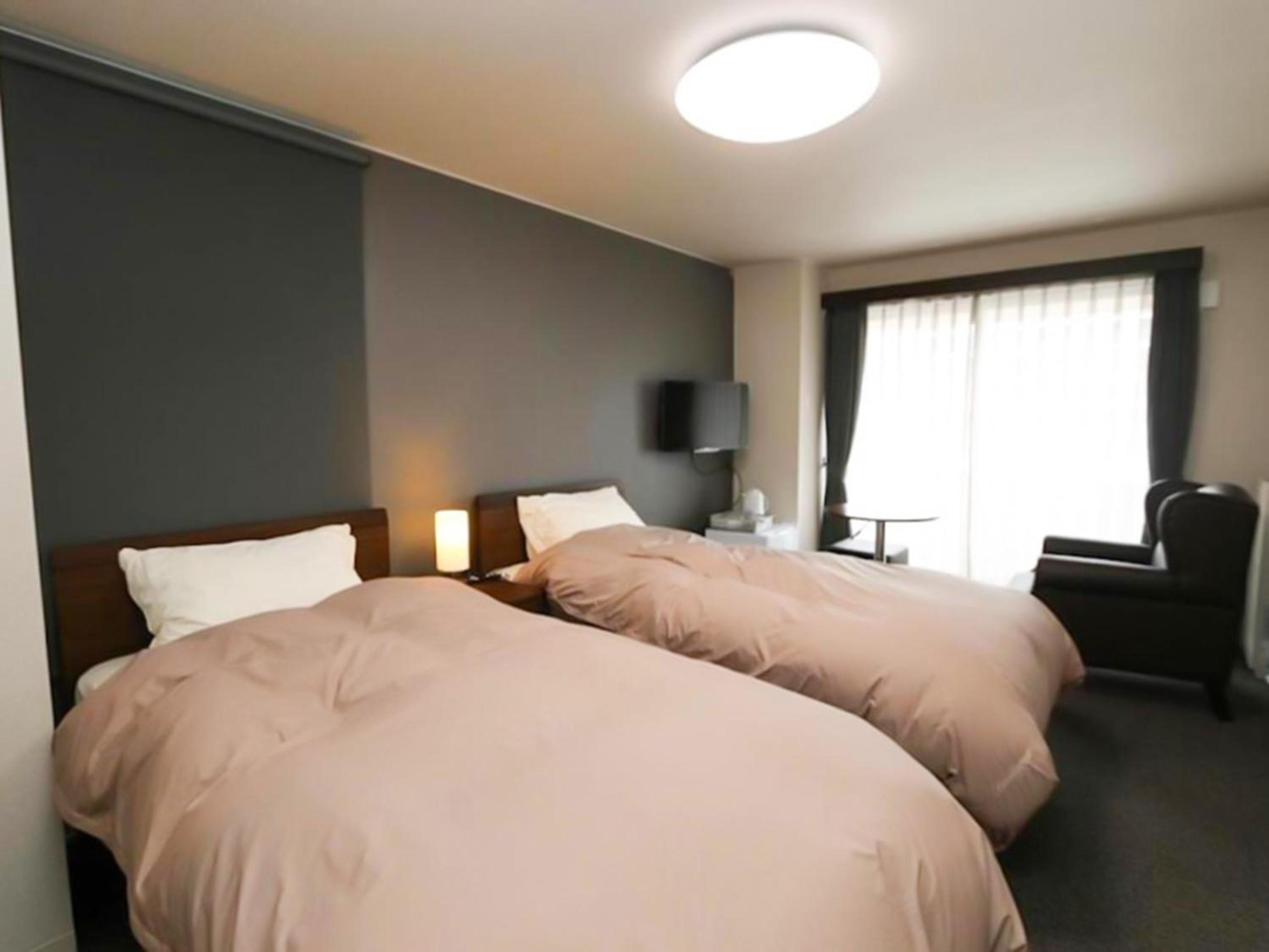Twin Room with Shared Bathroom photo 1