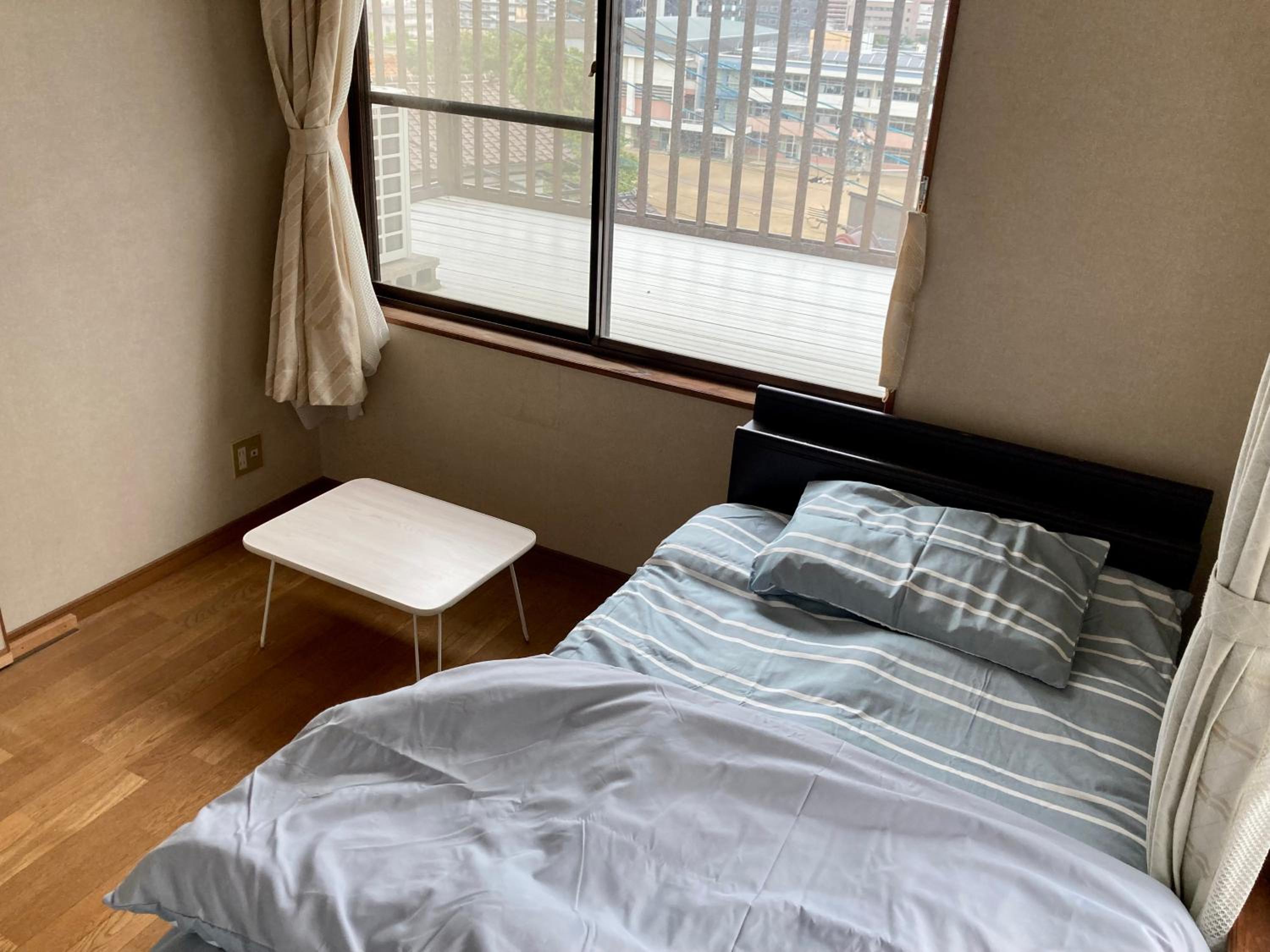 Single Room with Shared Bathroom photo 1