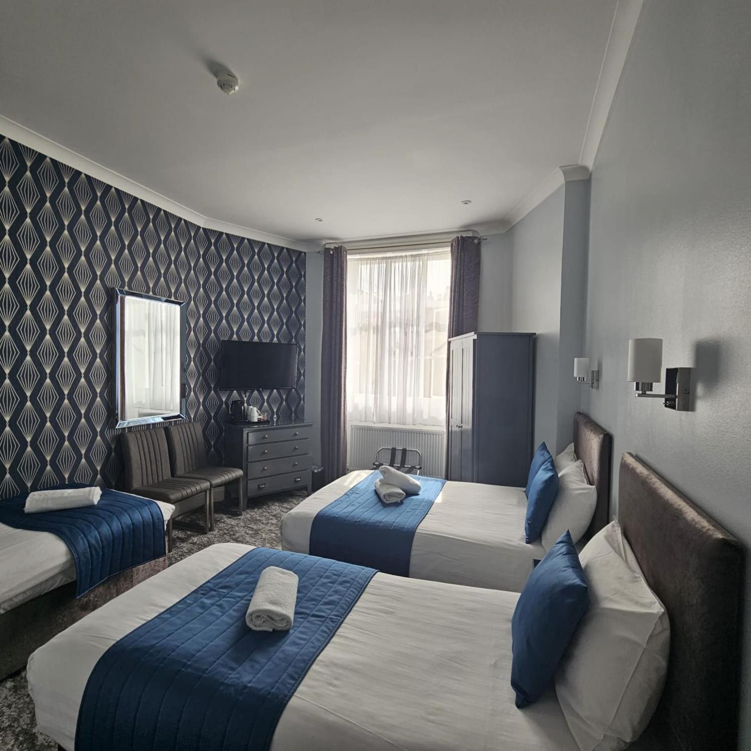 Quadruple Room en Suite photo 1