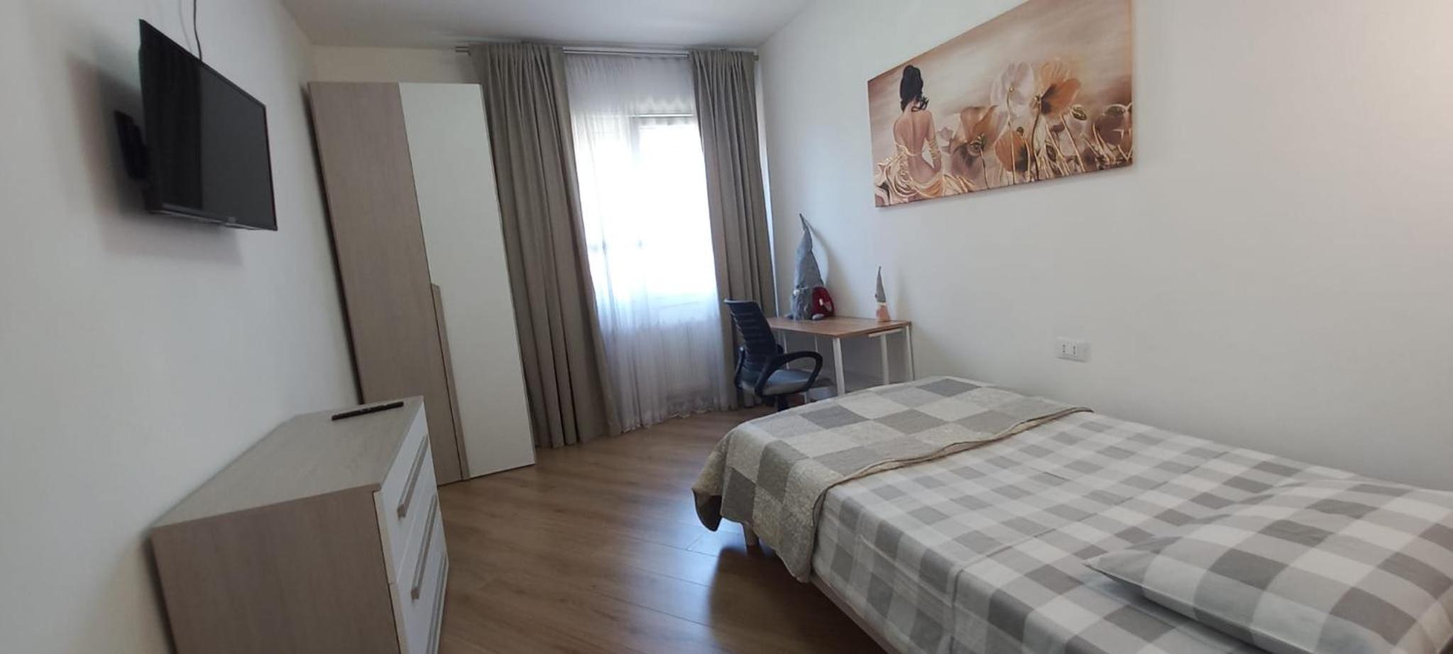 Three-Bedroom Apartment - Photo 4