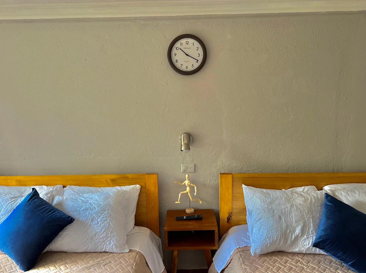 Deluxe Queen Room with Two Queen Beds photo 1