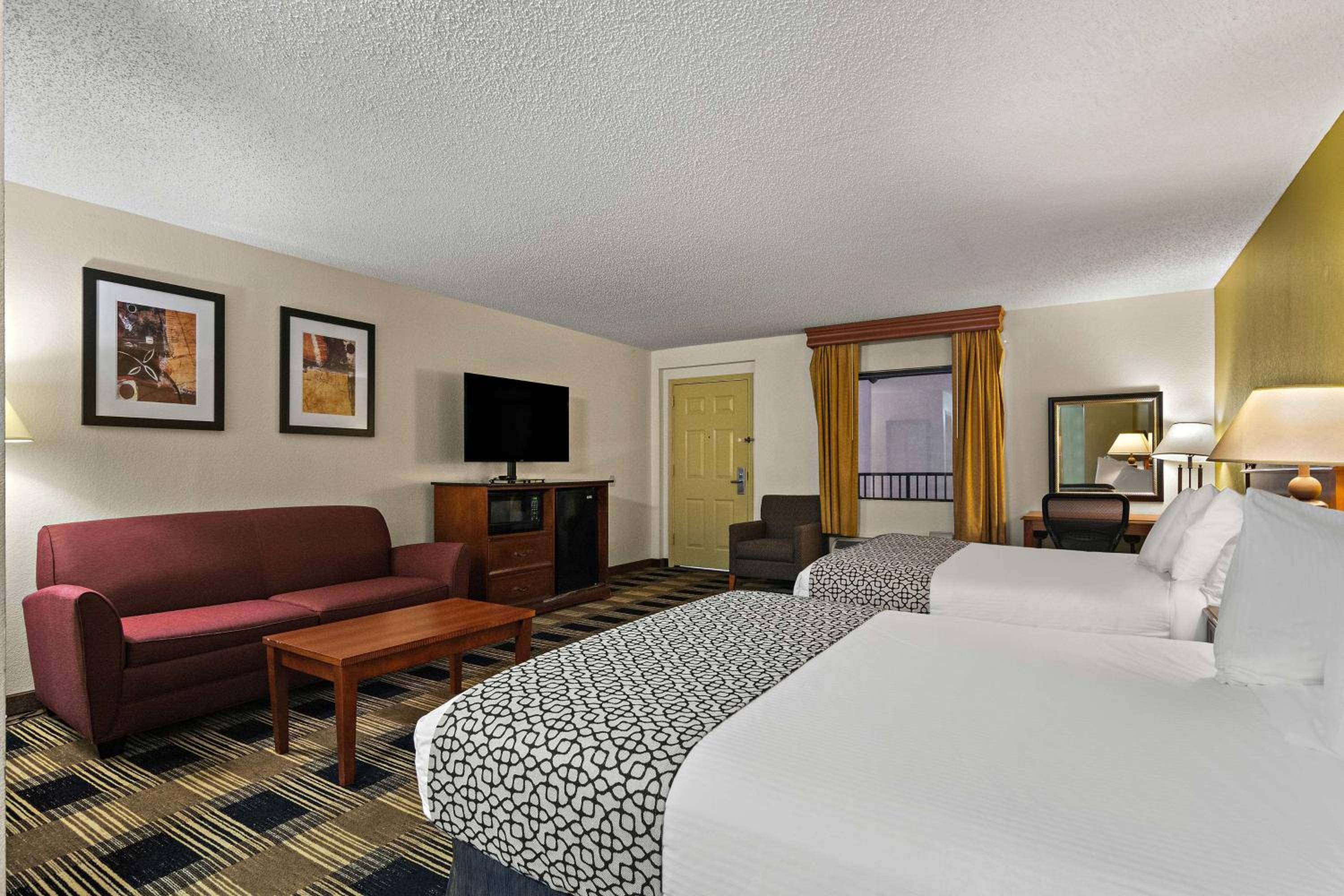 Queen Room with Two Queen Beds and Sofa Bed - Non-Smoking photo 1