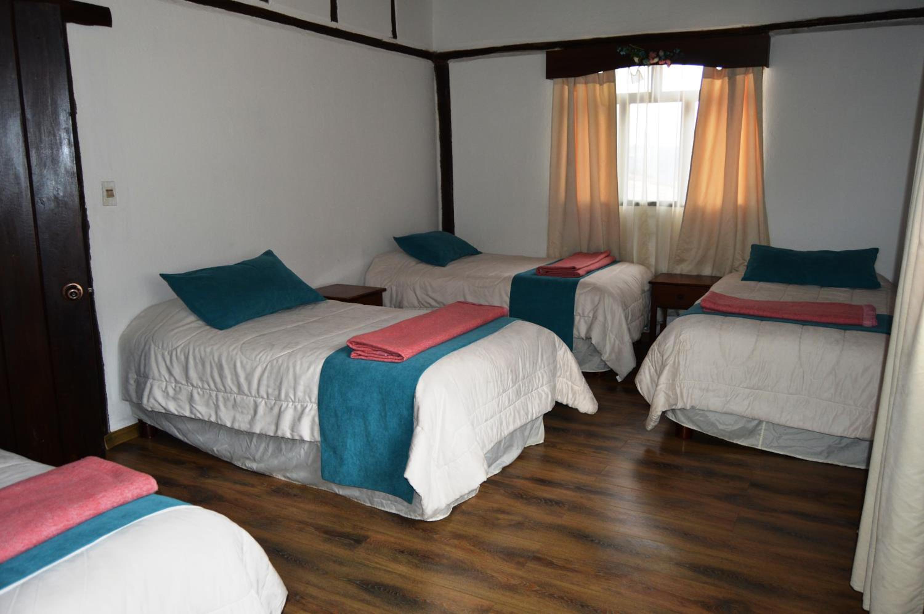 Quadruple Room with Private Bathroom photo 3
