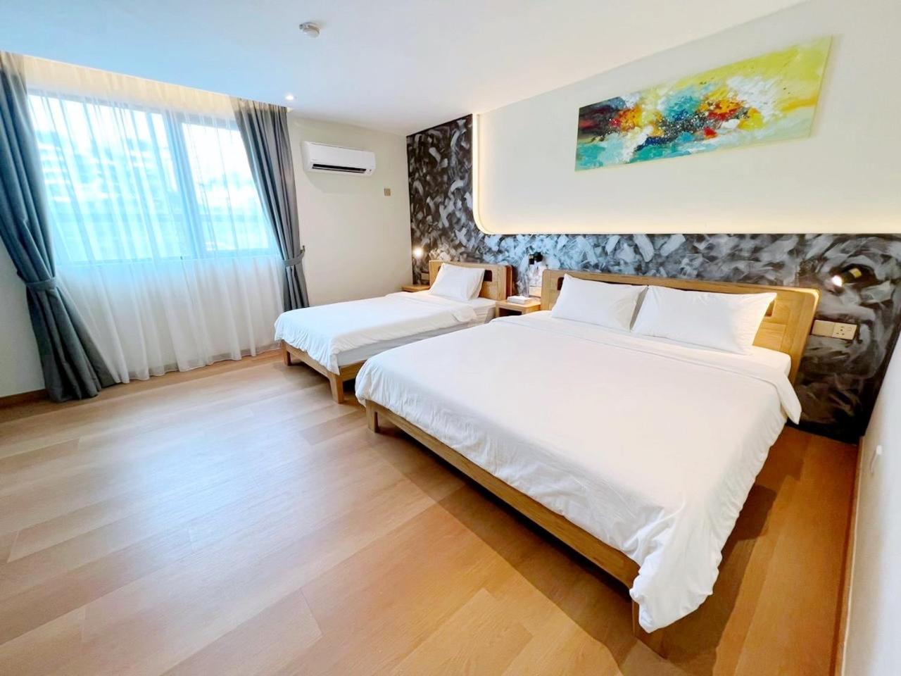 Deluxe Triple Room - Photo 1