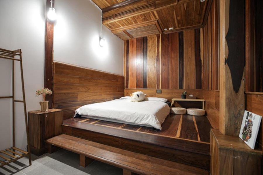 Double room with no windows and shared bathroom