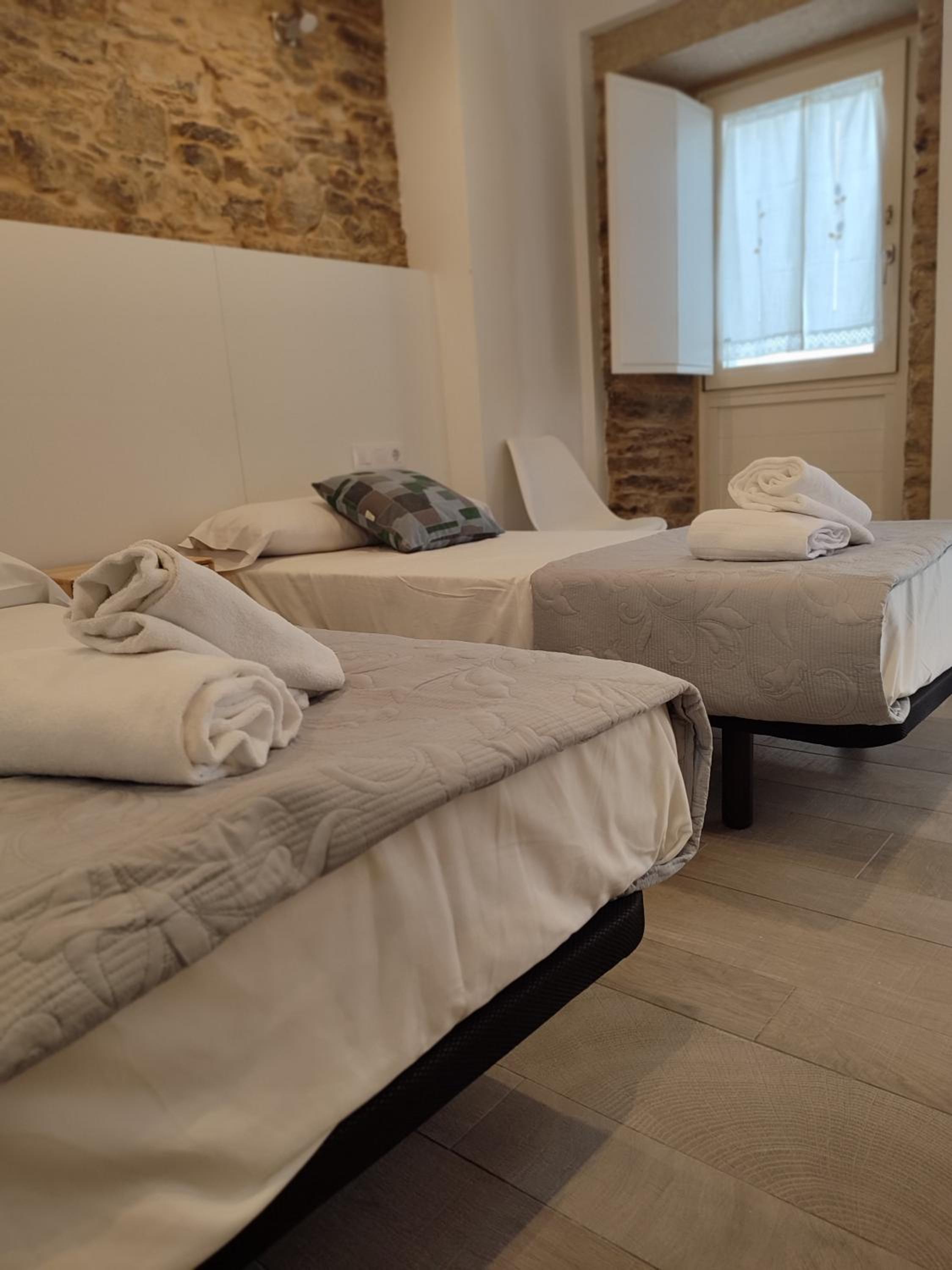 Habitación Doble con Dos Camas Dobles