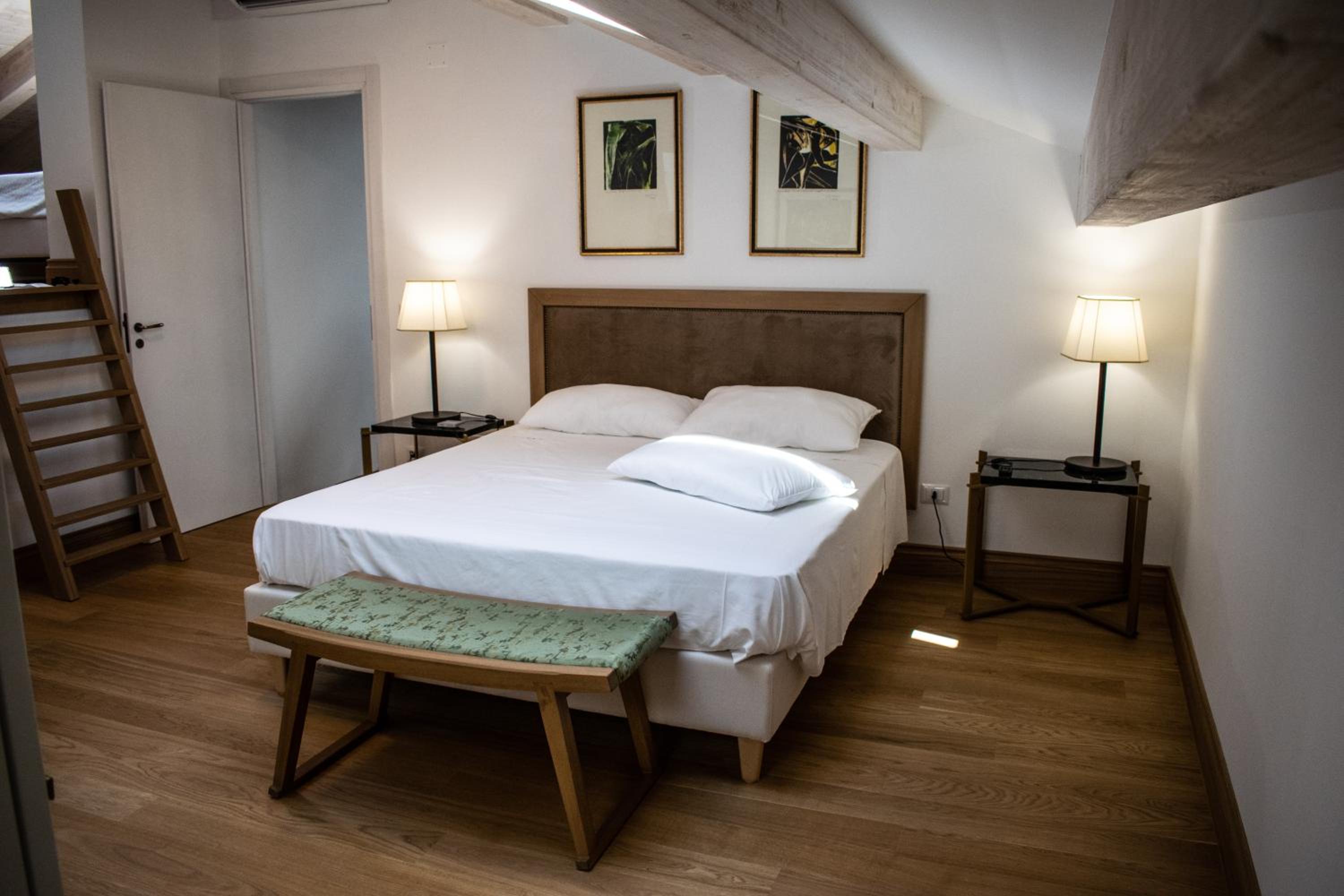 Deluxe Quadruple Room - Photo 1