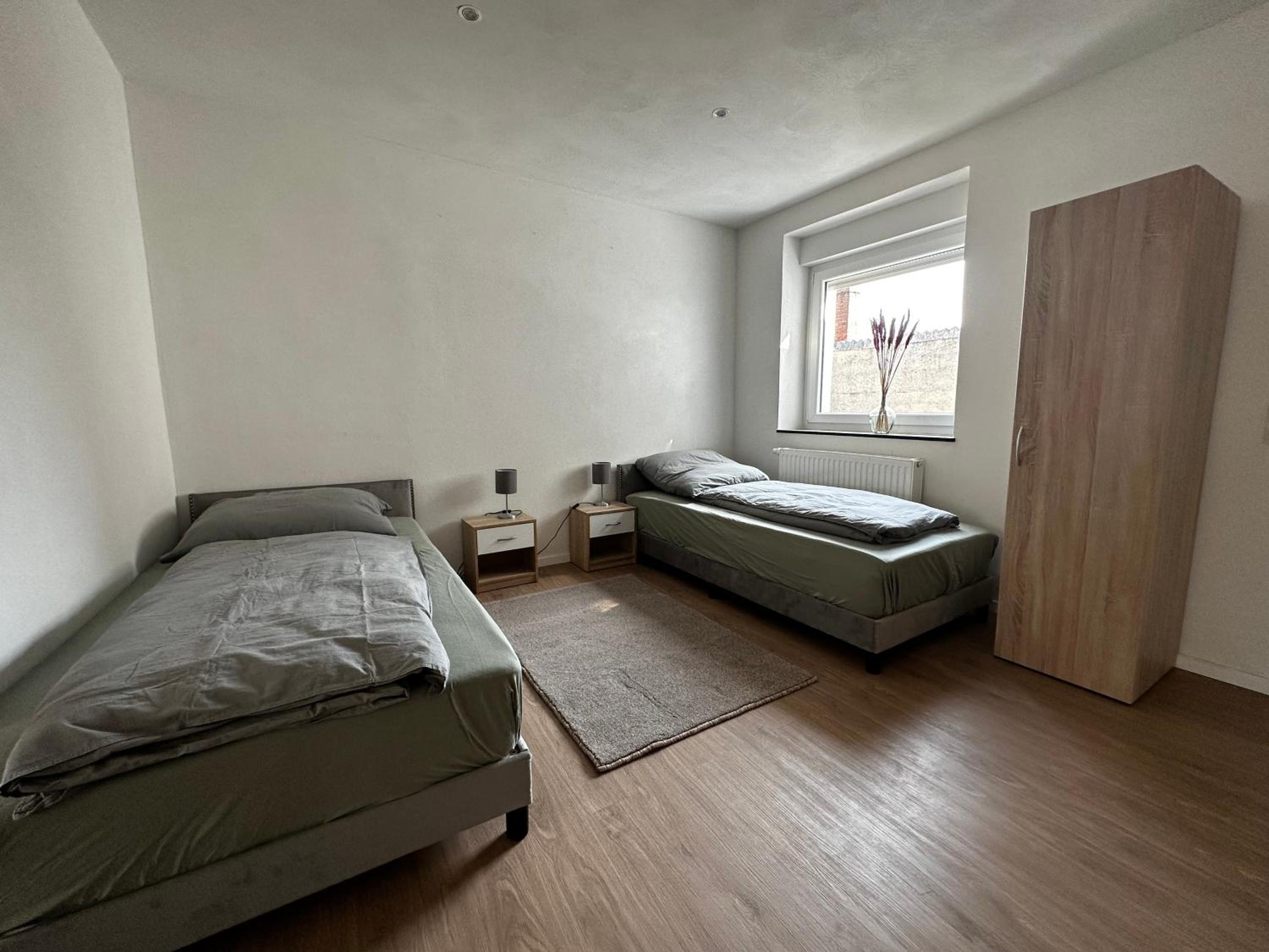 Three-Bedroom Apartment photo 1