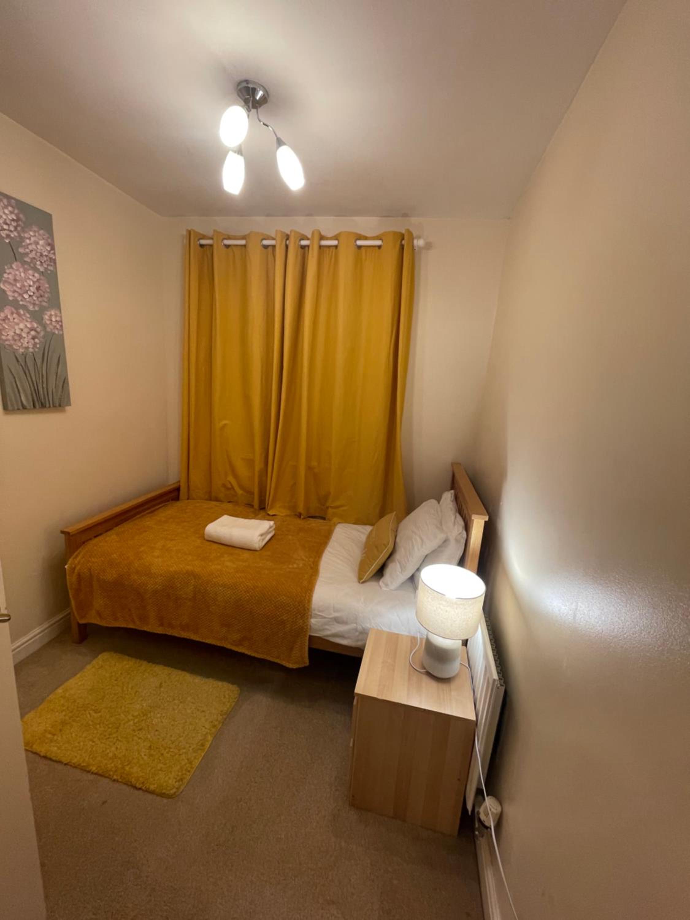 Three-Bedroom House - Photo 26
