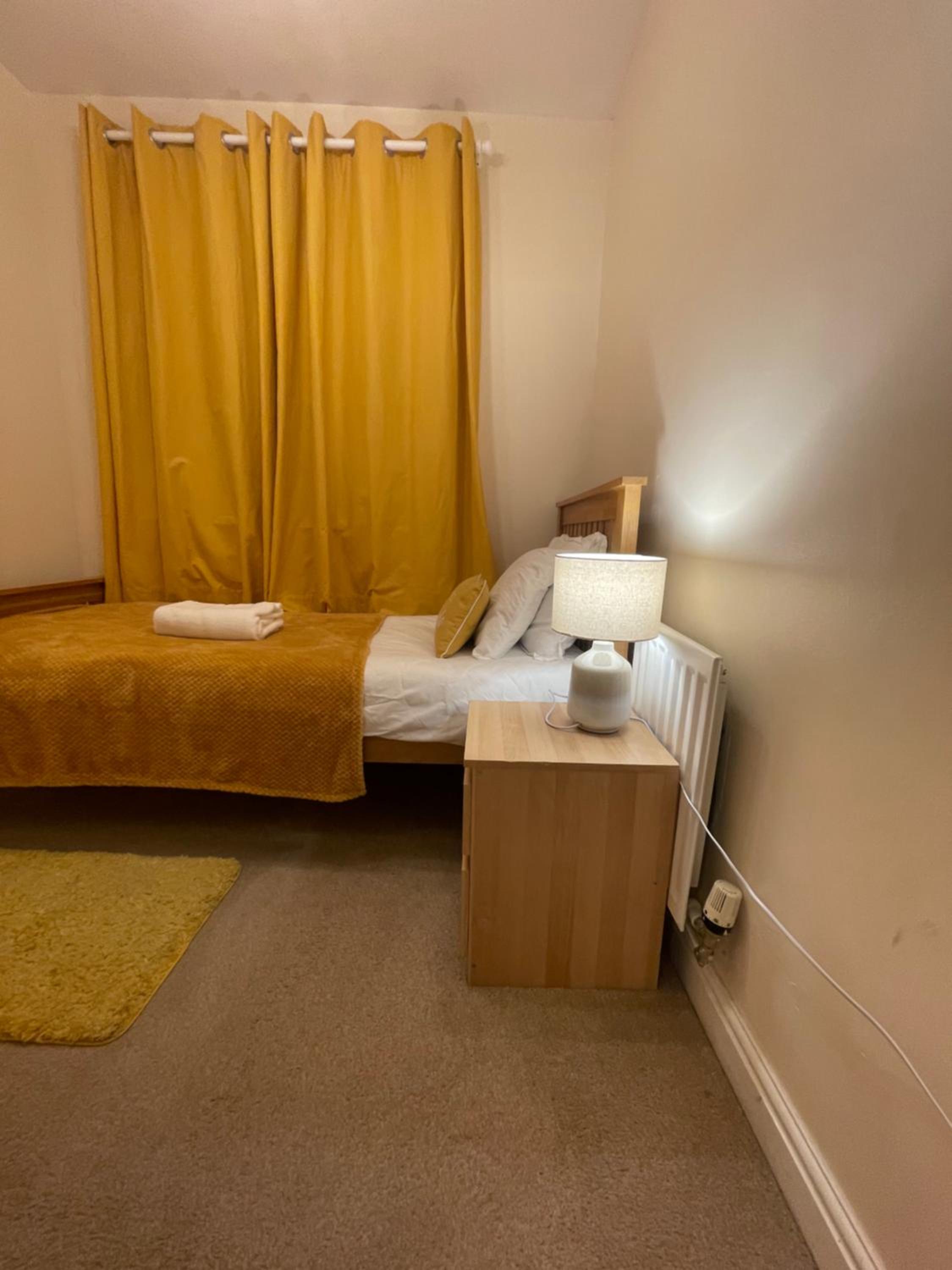 Three-Bedroom House - Photo 29