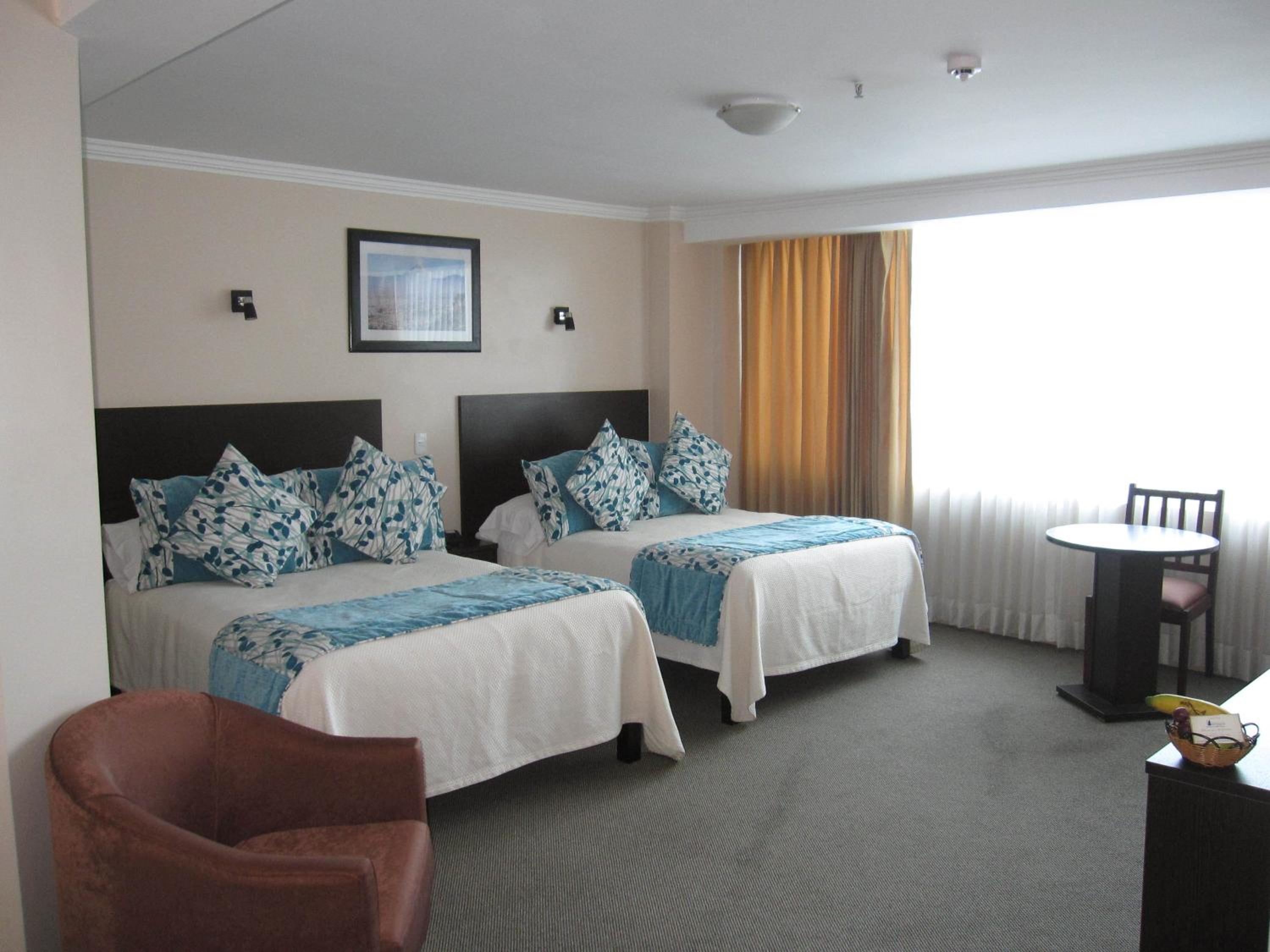 Deluxe Queen Room with Two Queen Beds photo 1