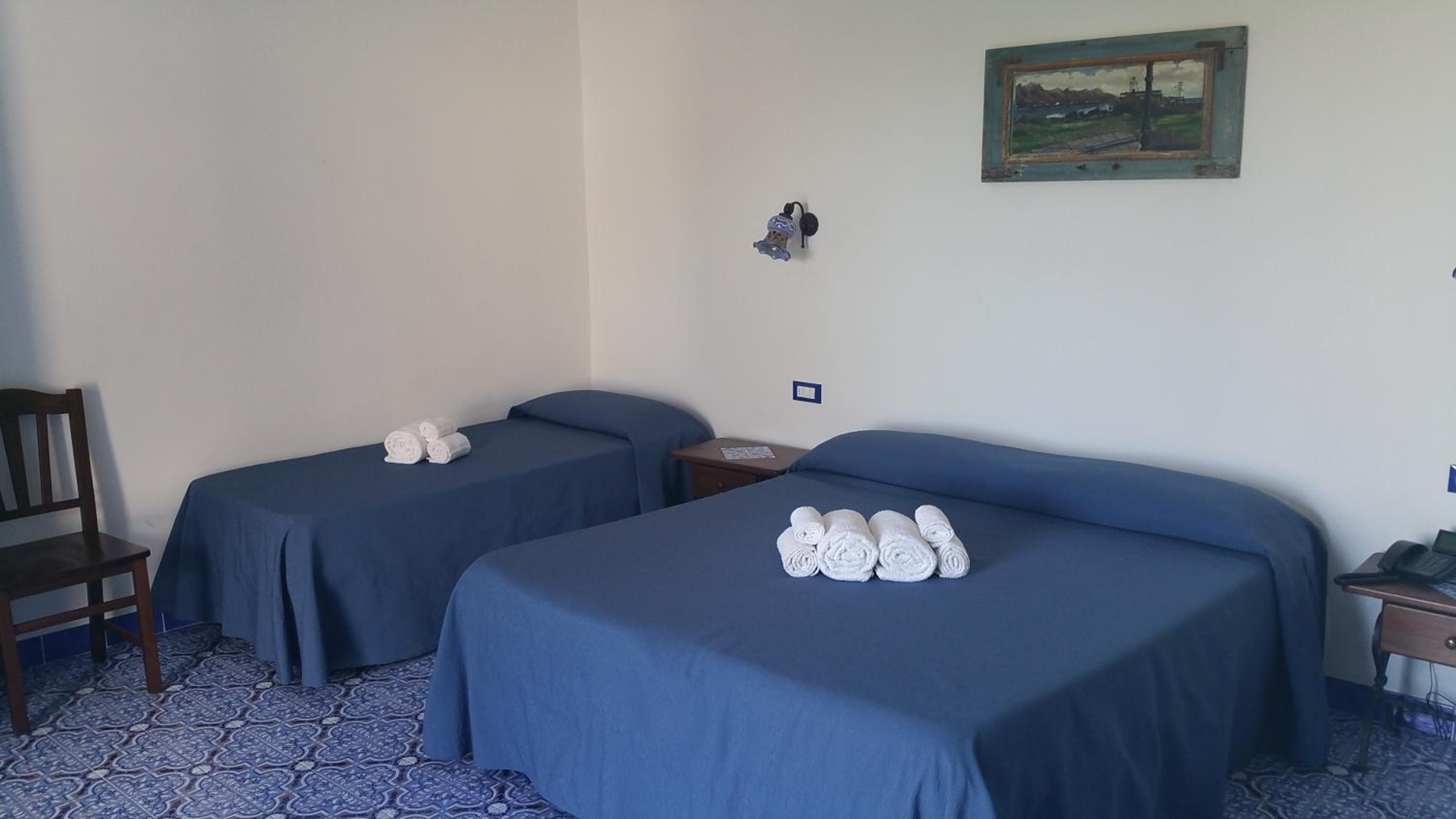 Quadruple Room with Balcony photo 2