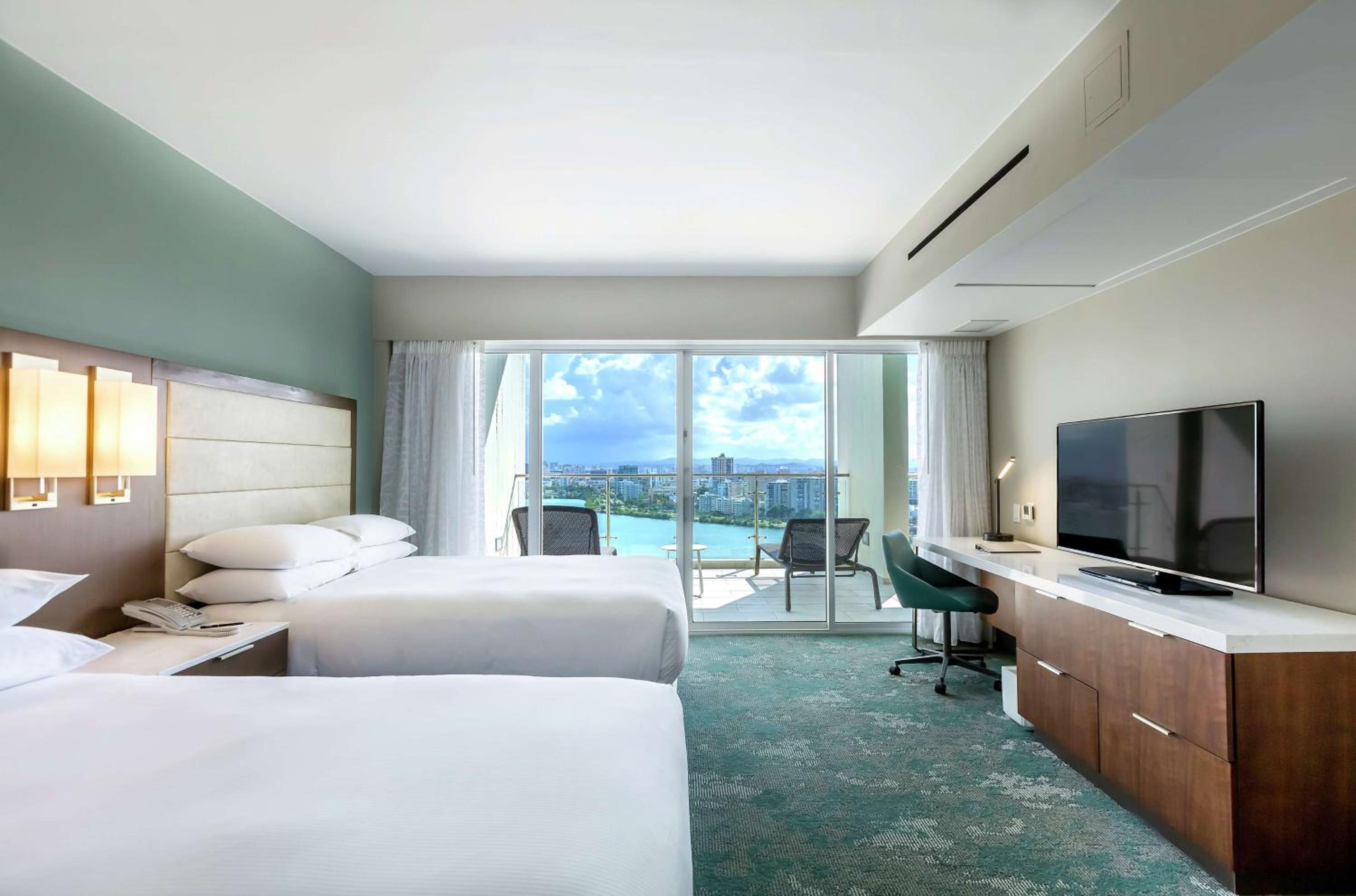 Two-Bedroom Suite with One King and Two Double Beds - Split Level photo 3