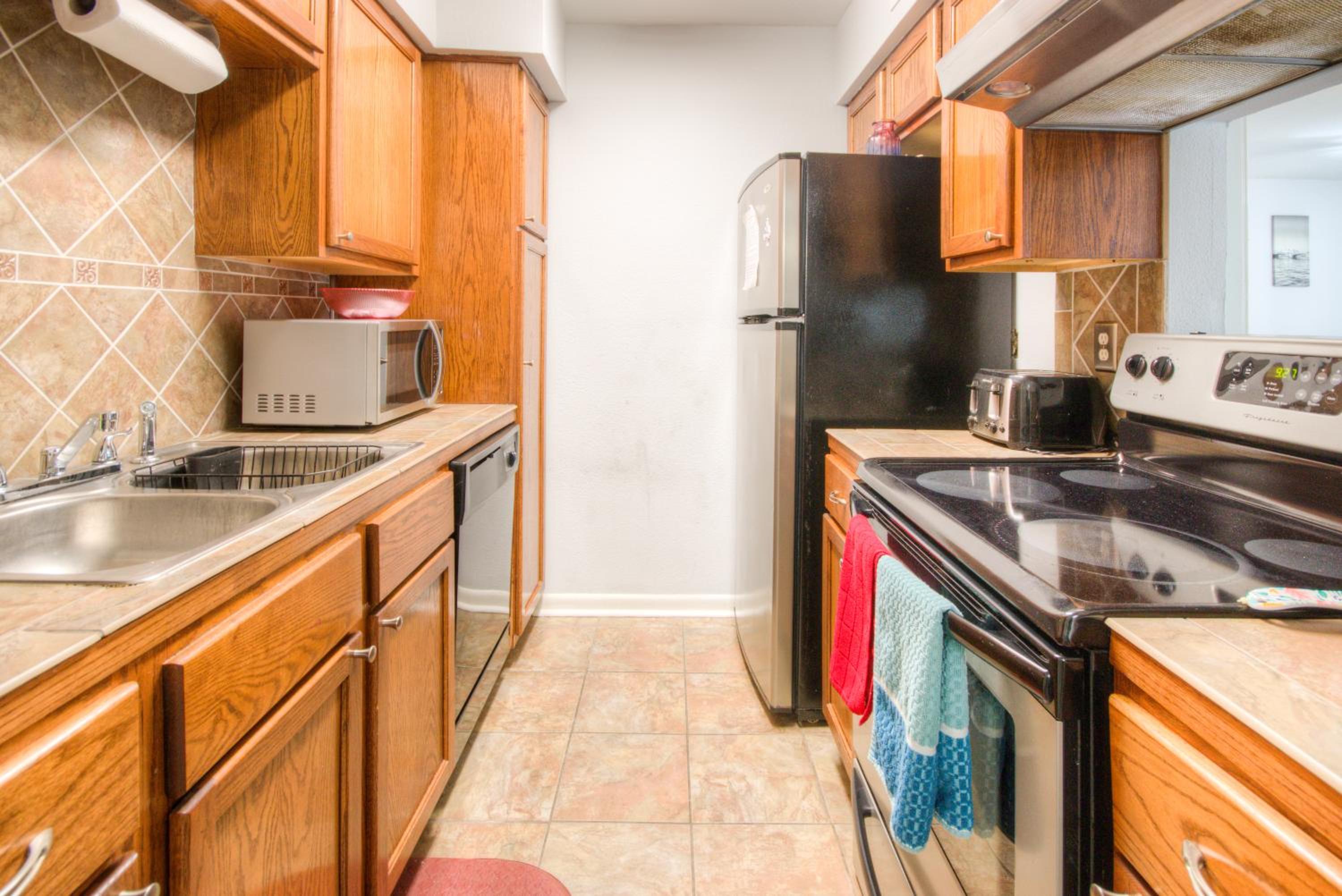 Three-Bedroom Apartment - Photo 41