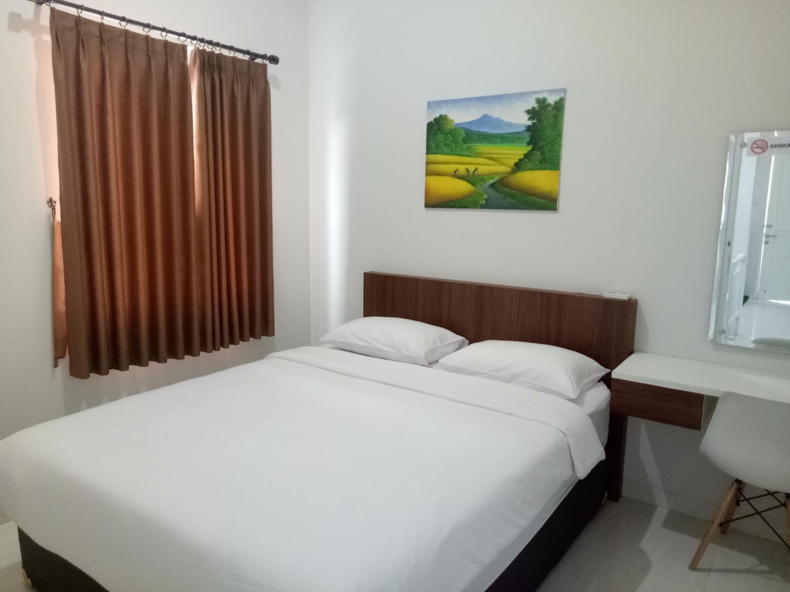 Four-Bedroom House - Photo 3