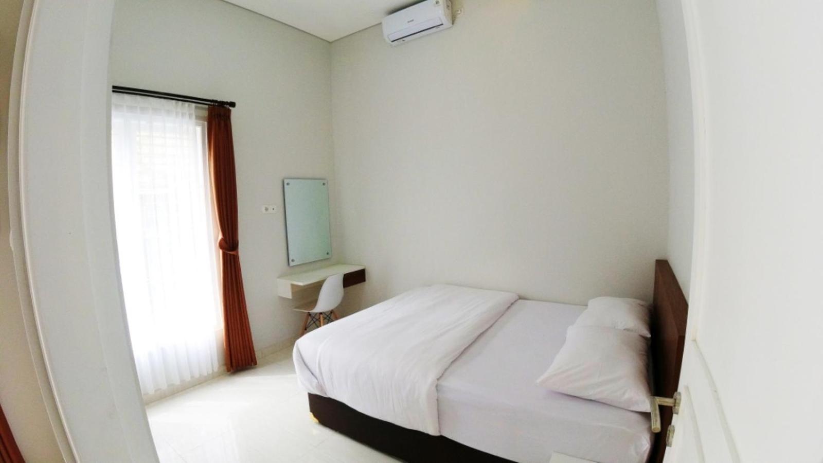 Three-Bedroom House - Photo 1