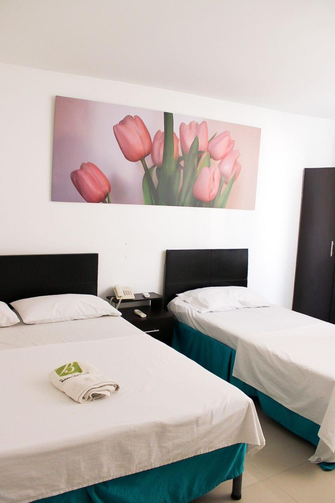 Economy Triple Room with Fan photo 2