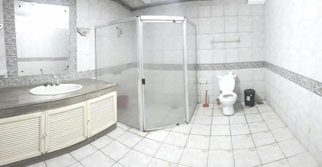 Three-Bedroom House - Photo 21