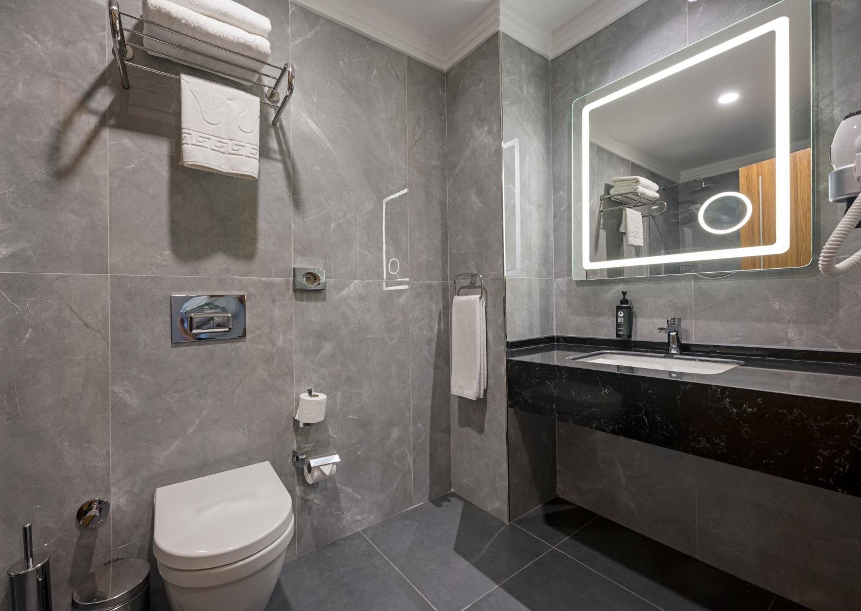 Deluxe Room with City View and Balcony