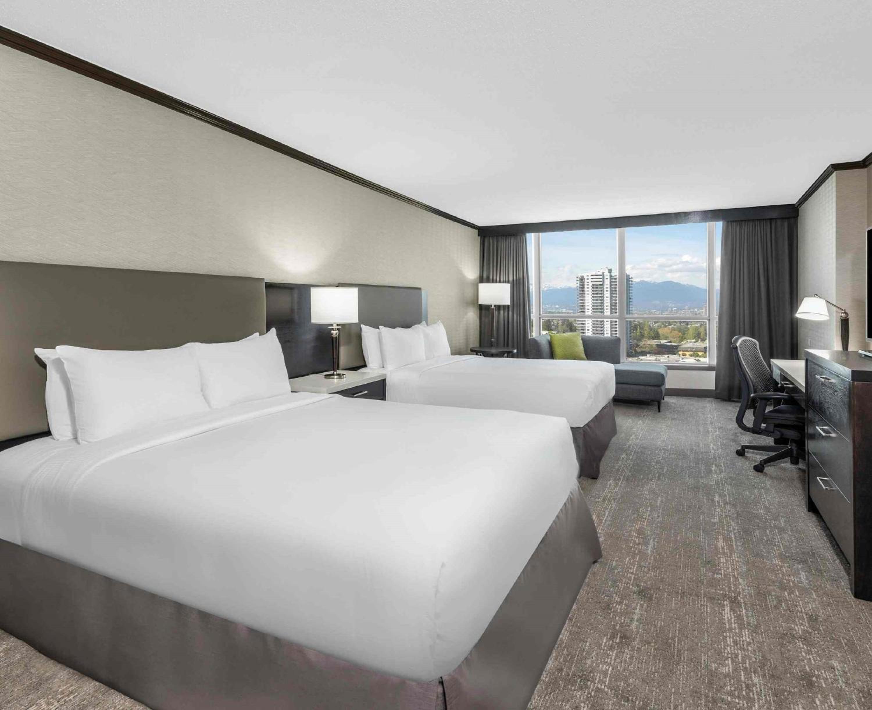 Deluxe Queen Room with Two Queen Beds - Photo 1
