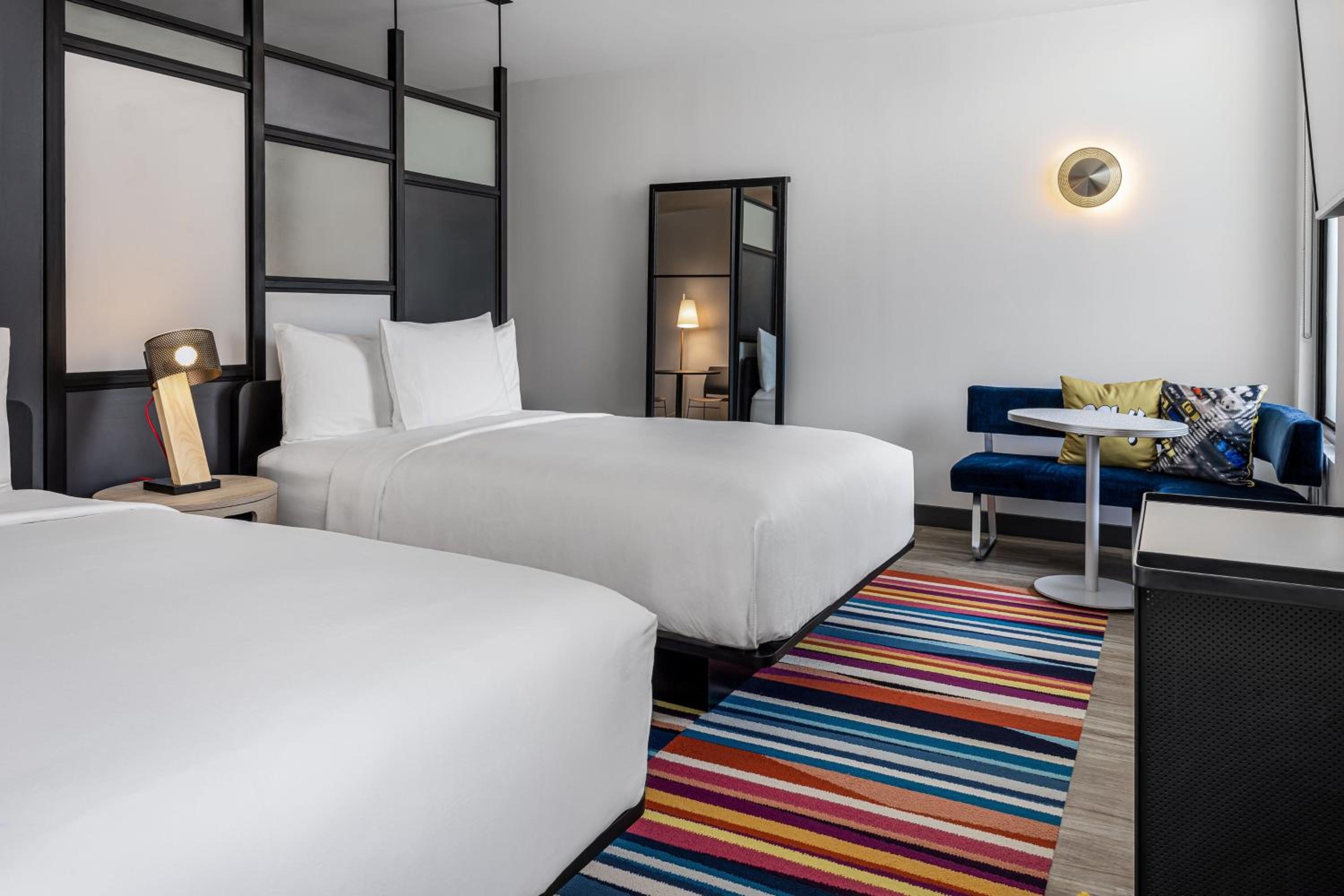 Queen Room with Two Queen Beds and City View - Photo 1