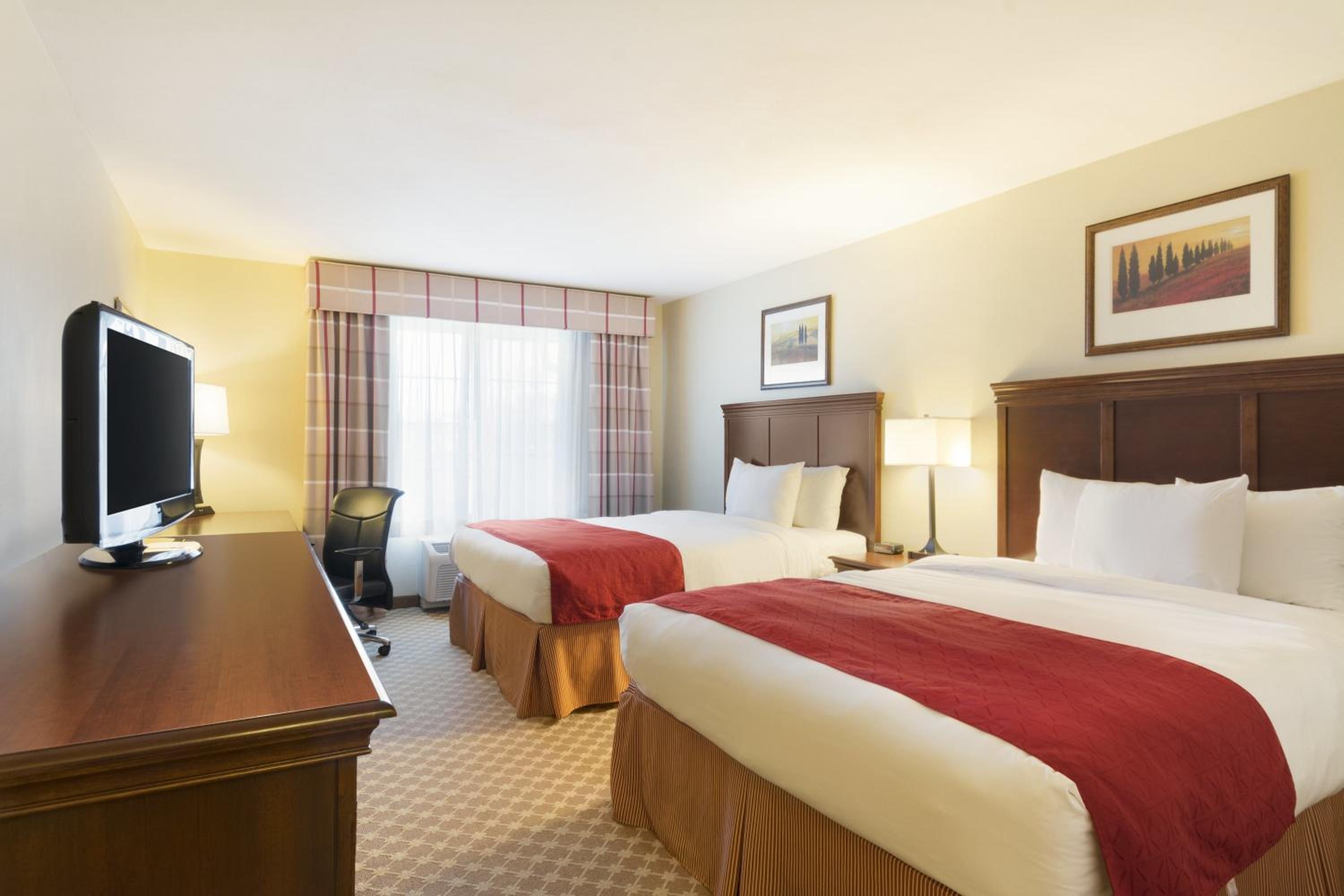 Queen Room with Two Queen Beds - Non-Smoking - Photo 1