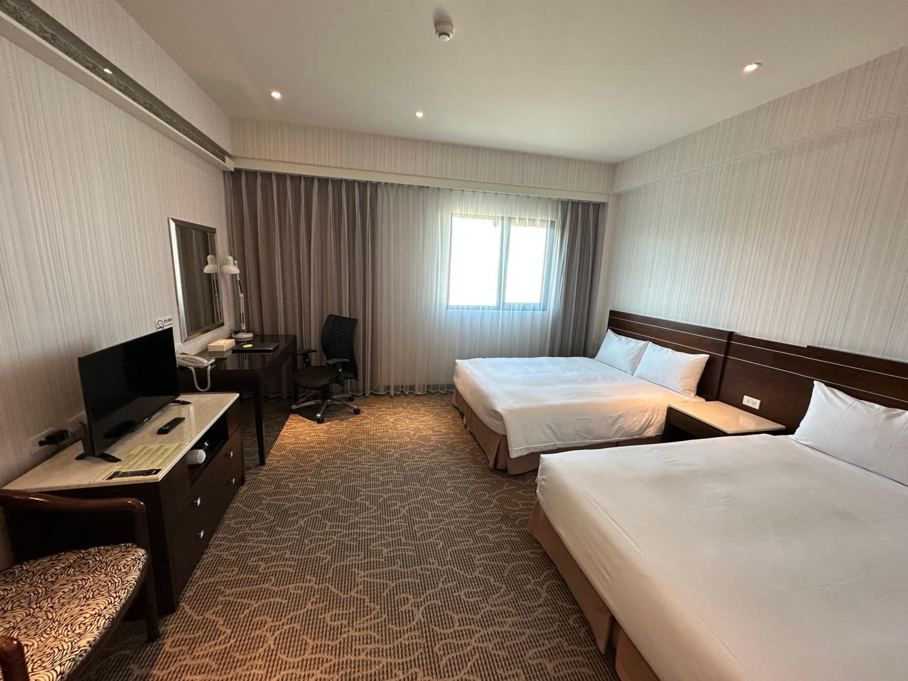 Deluxe Quadruple Room - Photo 8