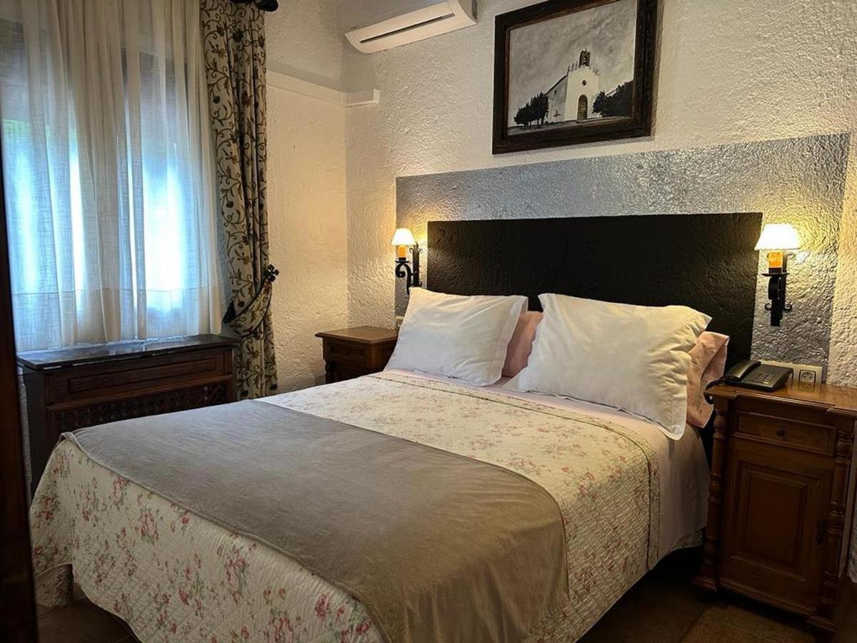 Habitación Doble con cama supletoria (2 adultos + 1 niño)