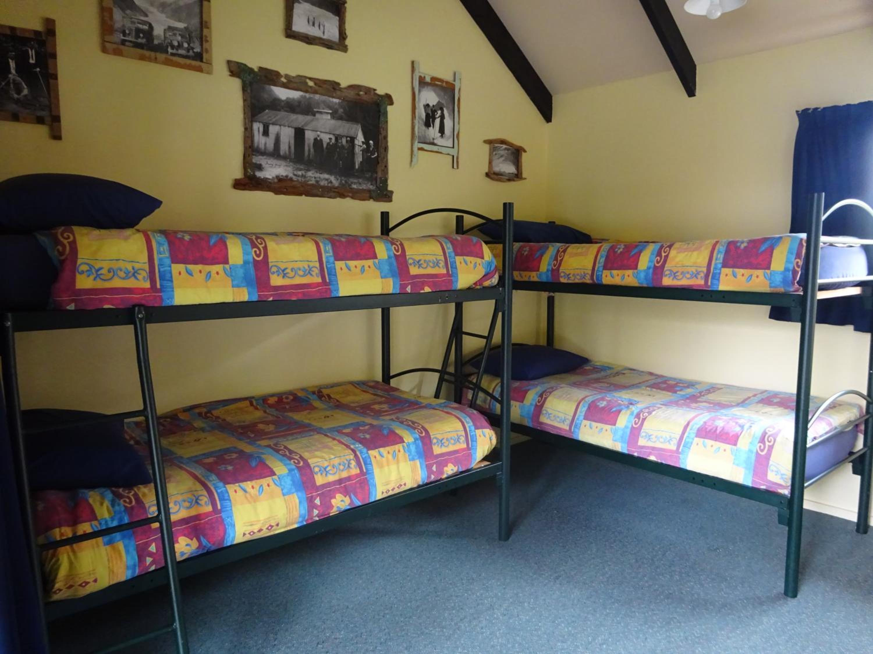 Bed in 4-Bed Mixed Dormitory Room with Private Bathroom photo 1