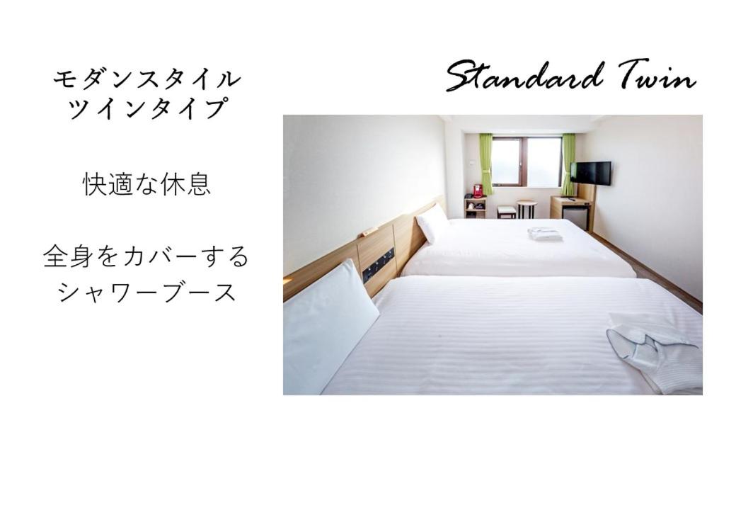 Standard Twin Room - Photo 9