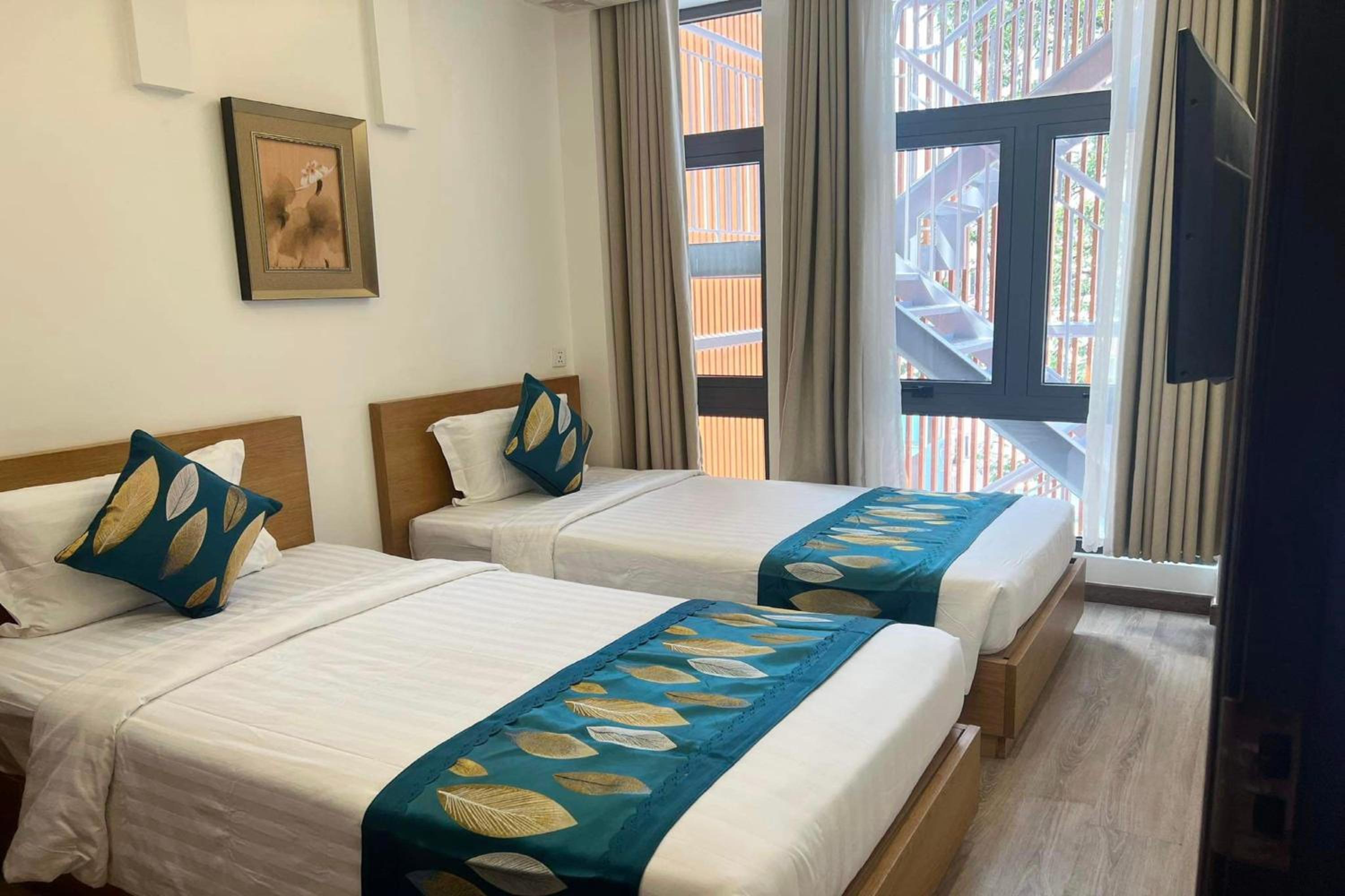 Deluxe Twin Room - Photo 11