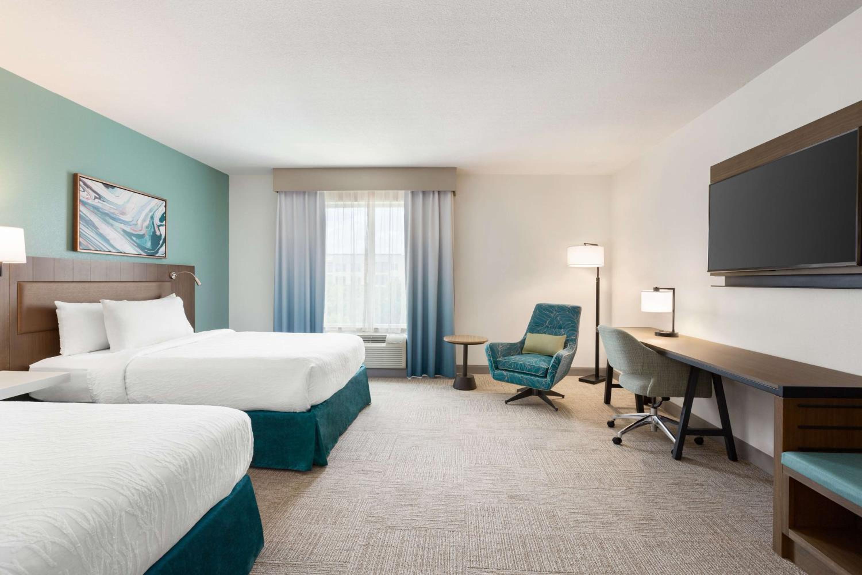 Queen Room with Two Queen Beds and Bath Tub - Mobility/Hearing Accessible - Photo 1