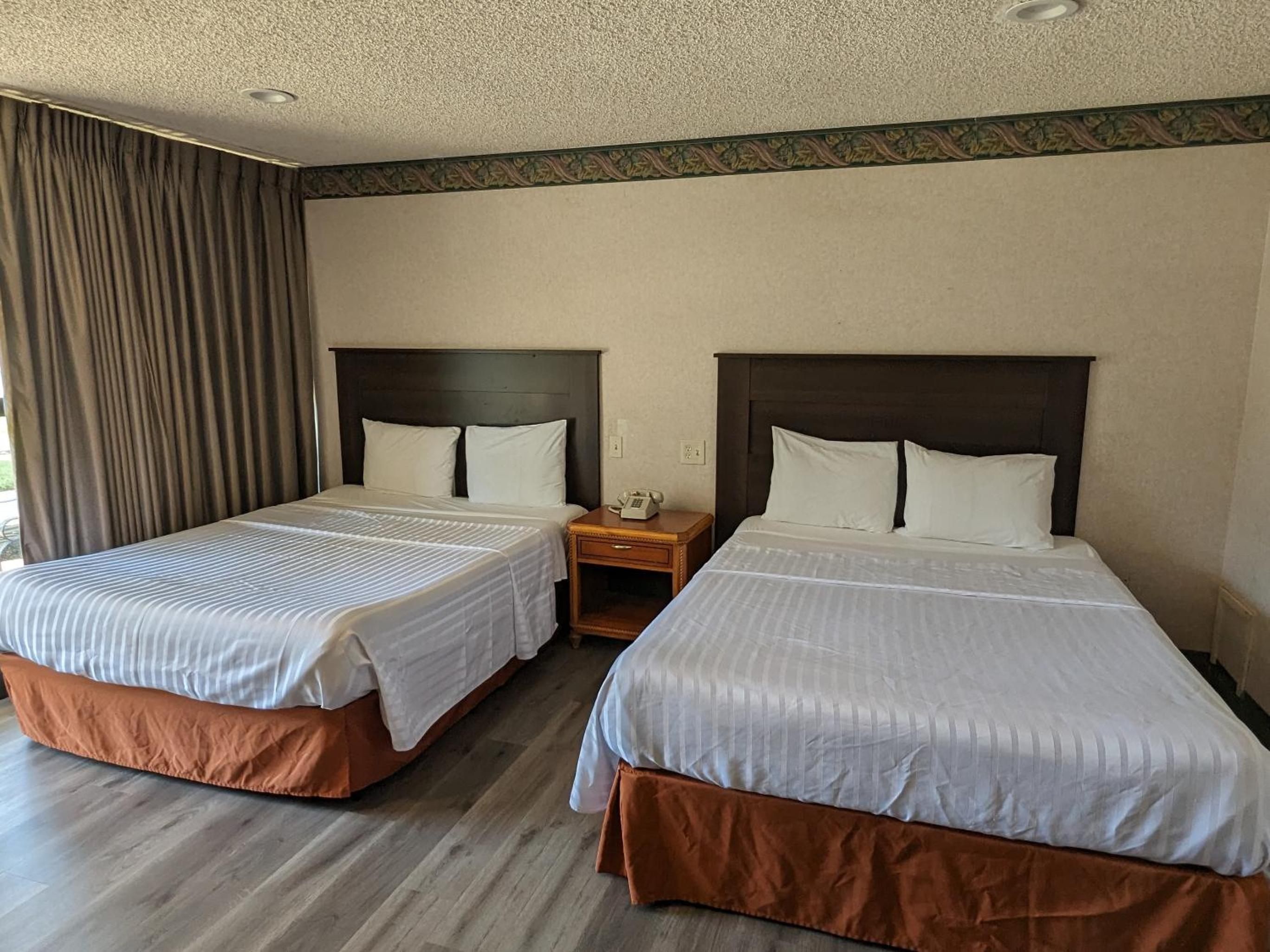 Two Queen Bed Room Interior at Valley Inn in Mission Hills
