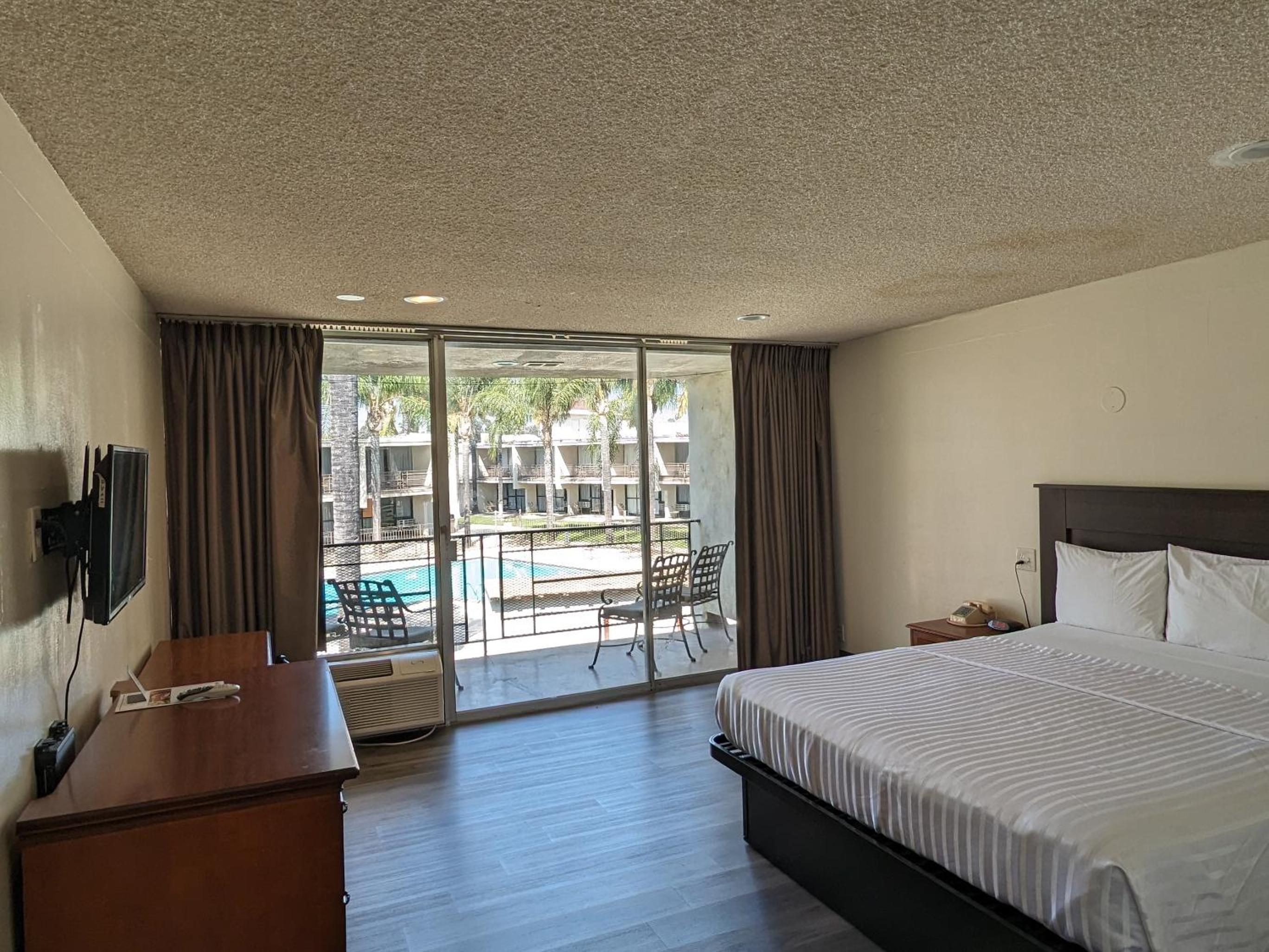 King Bed Room Interior at Valley Inn in Mission Hills