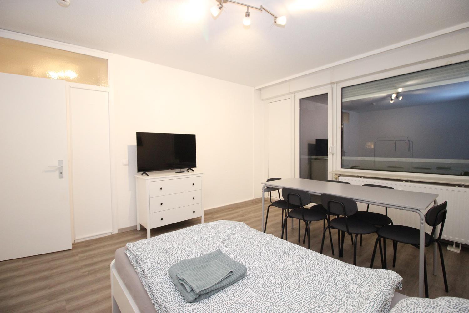 Three-Bedroom Apartment photo 1